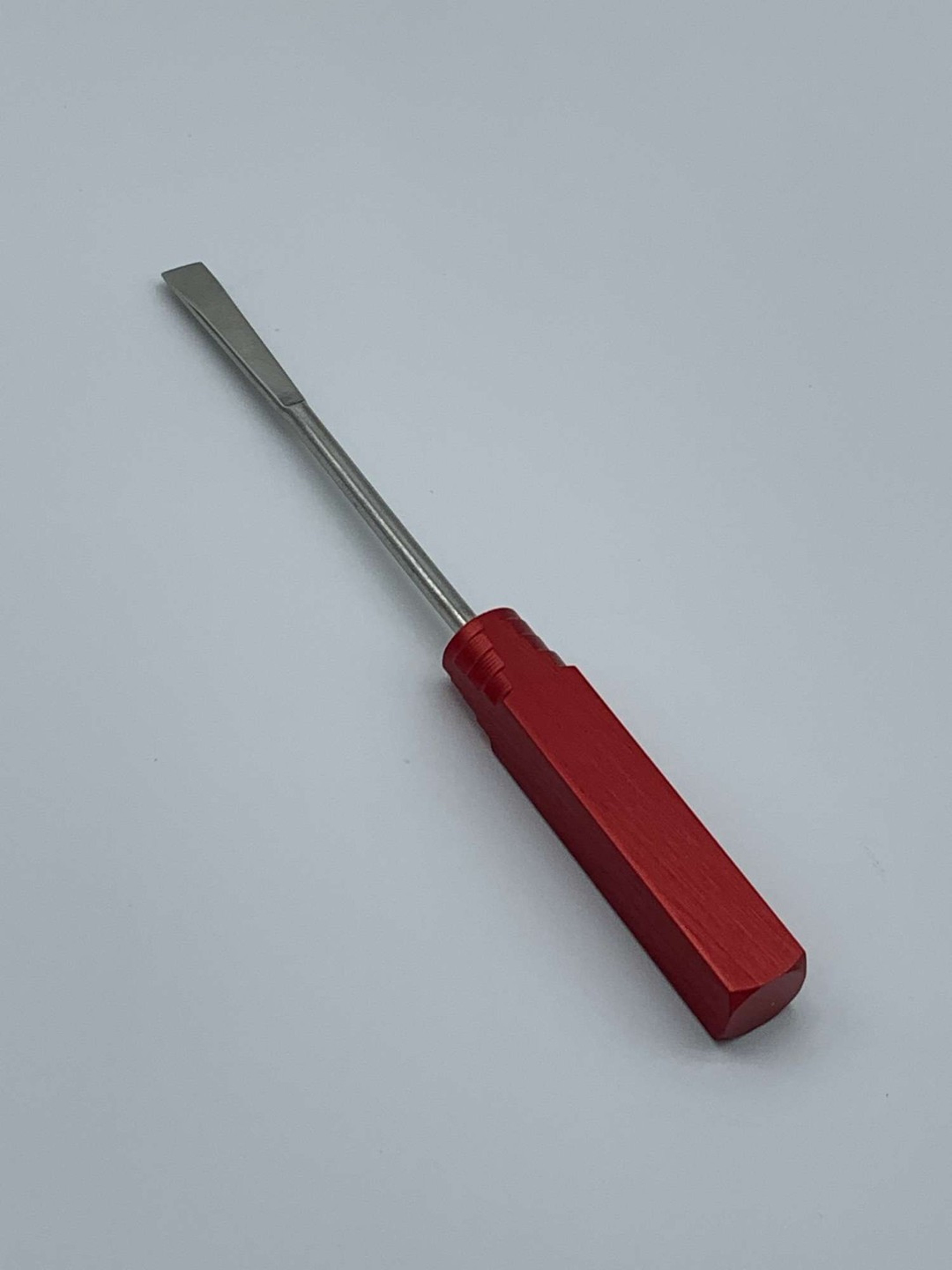 Preview pic of Red metal dab tool