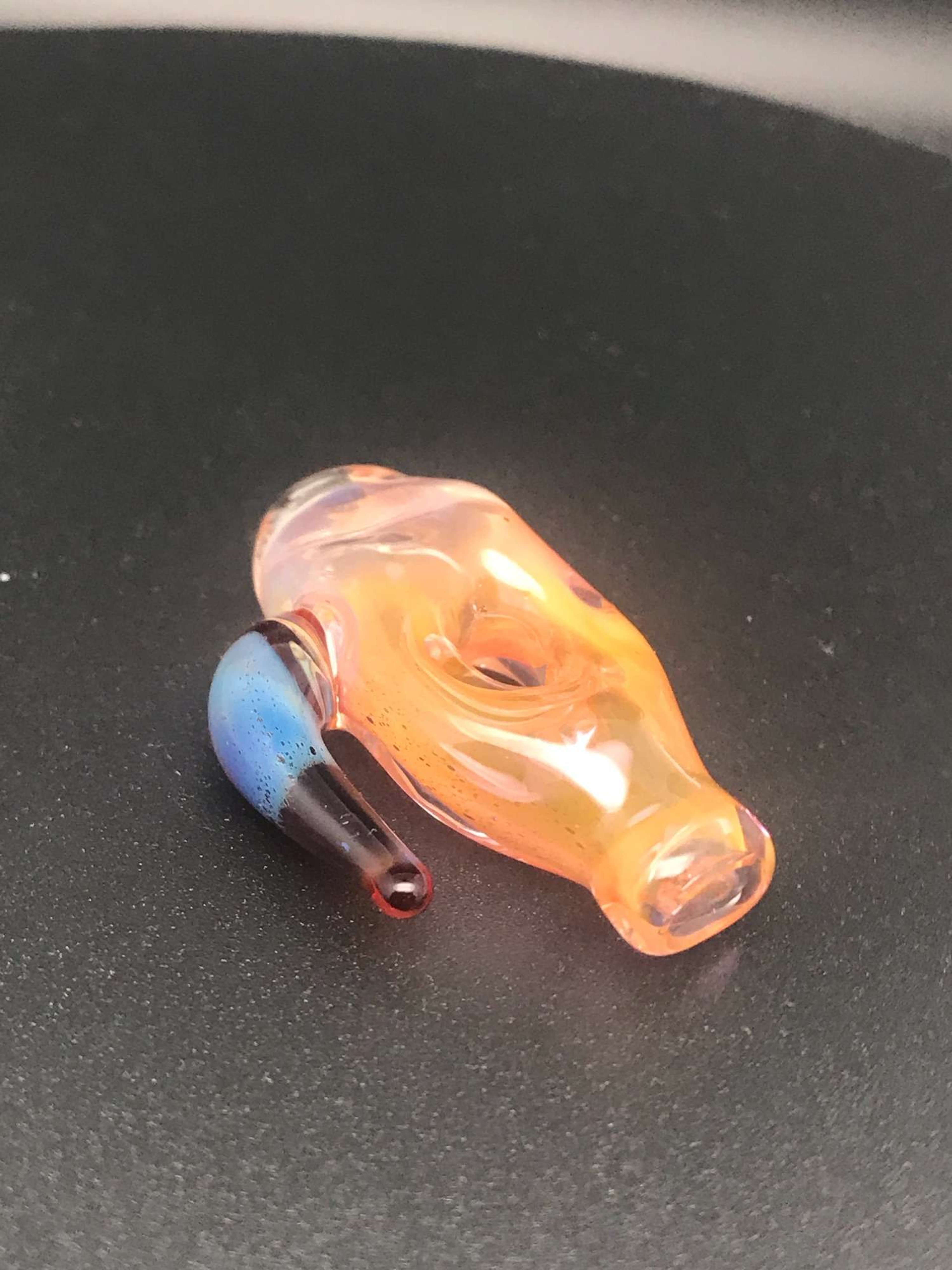 Joint tip w donut and horn iso gold fume image 0