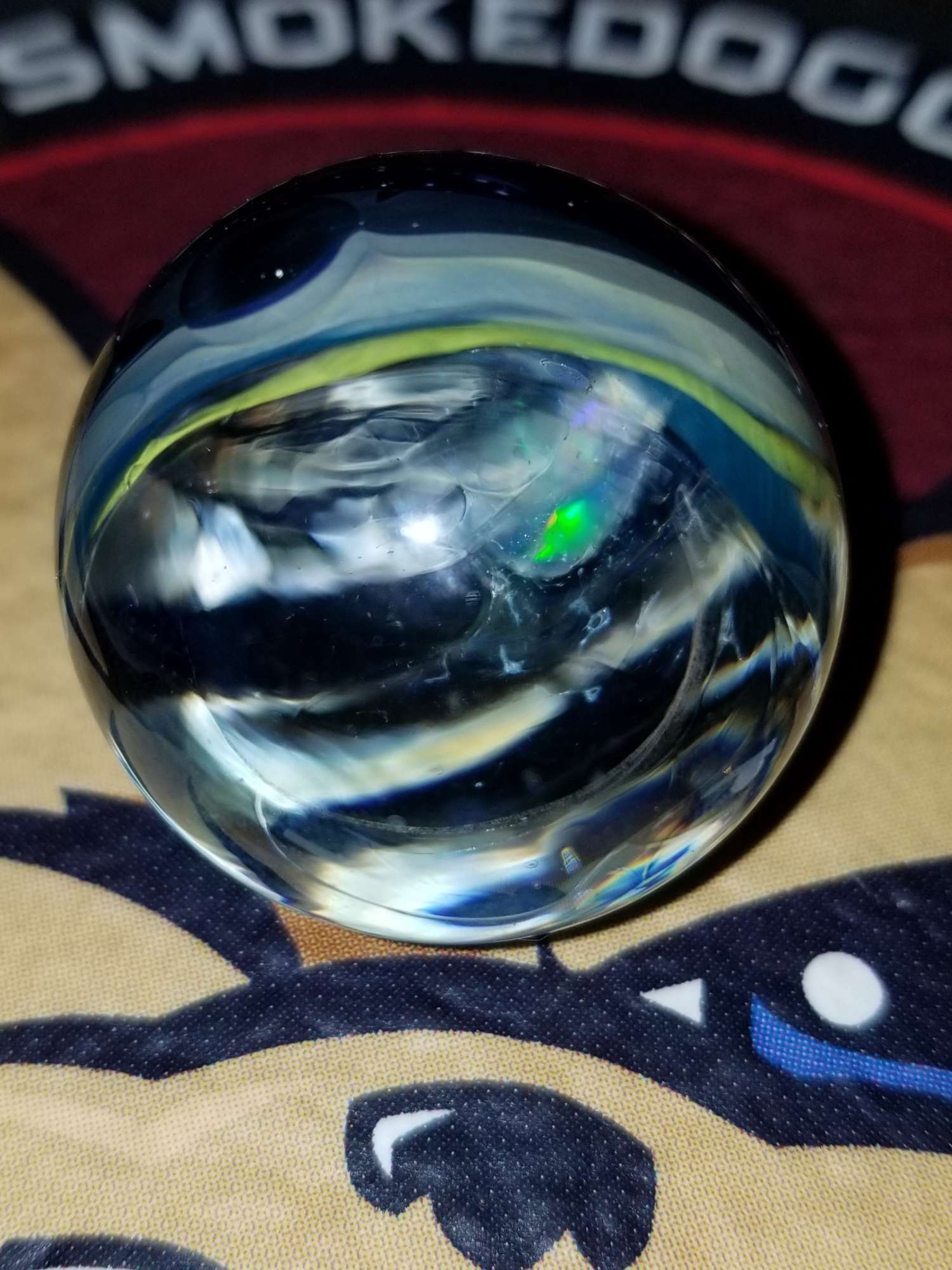 Preview pic of Vortex magnified glass marble with green opal