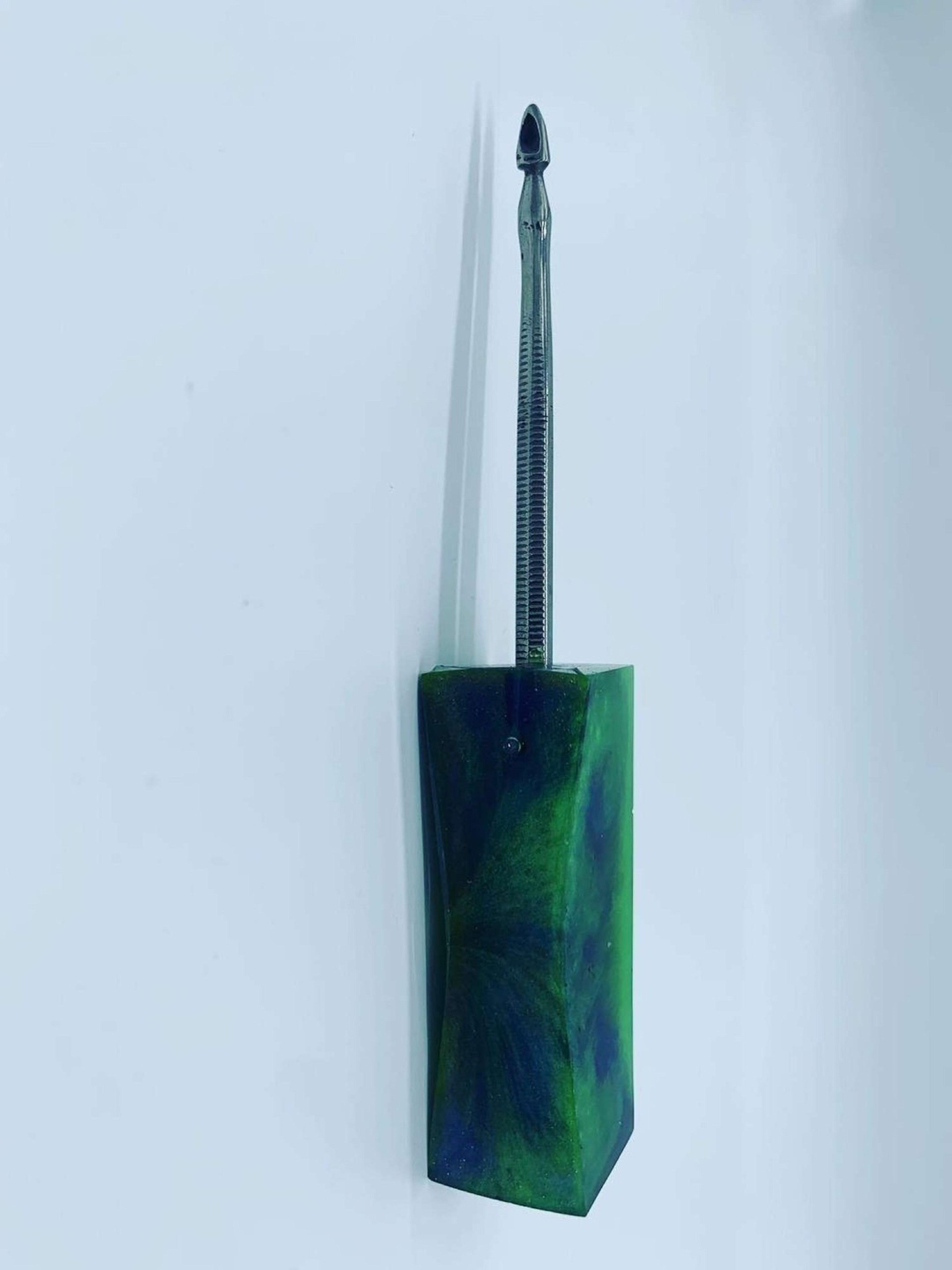 Green and blue swirl resin tool image 0