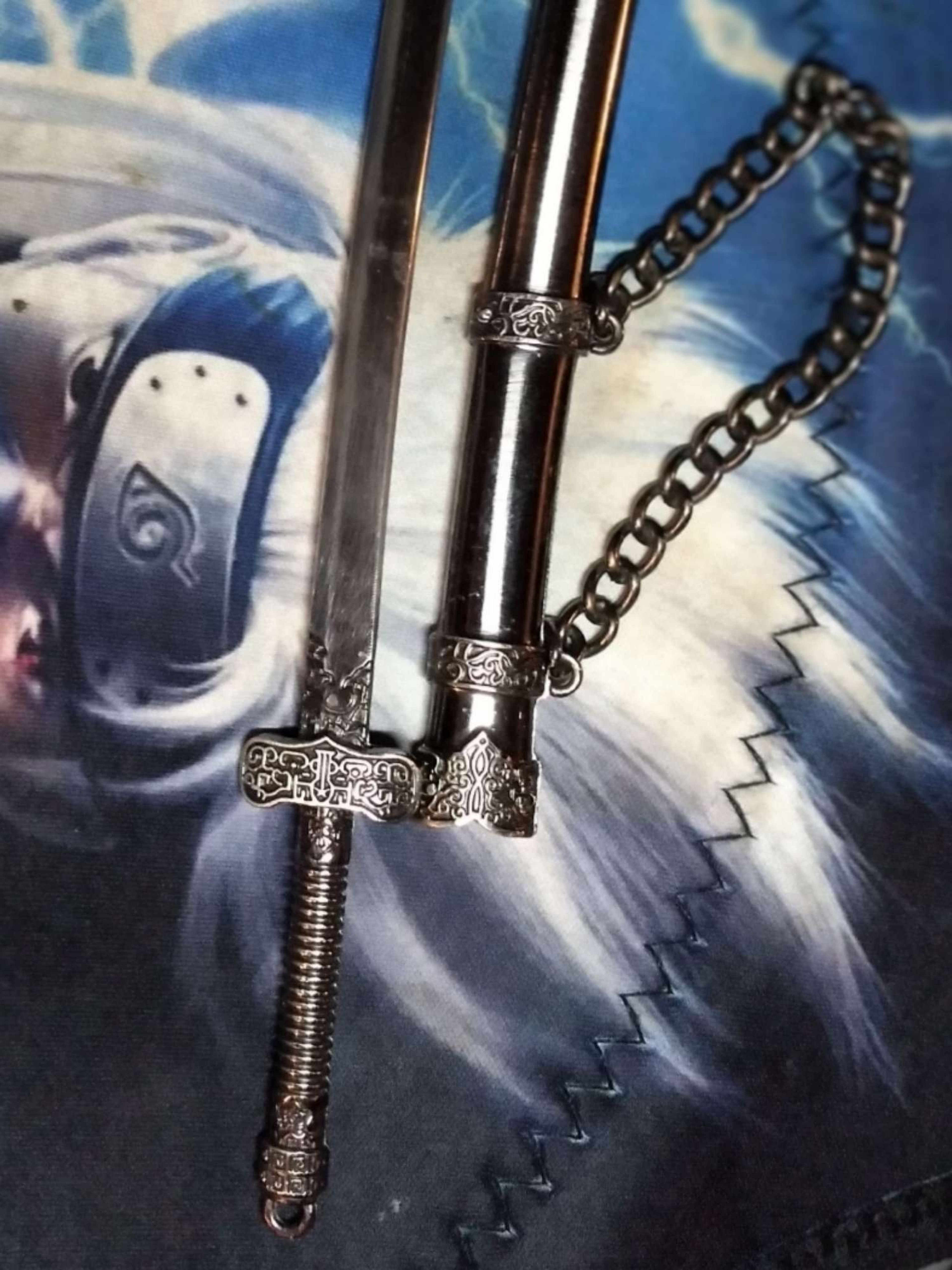 Sword dabber with sheath image 0