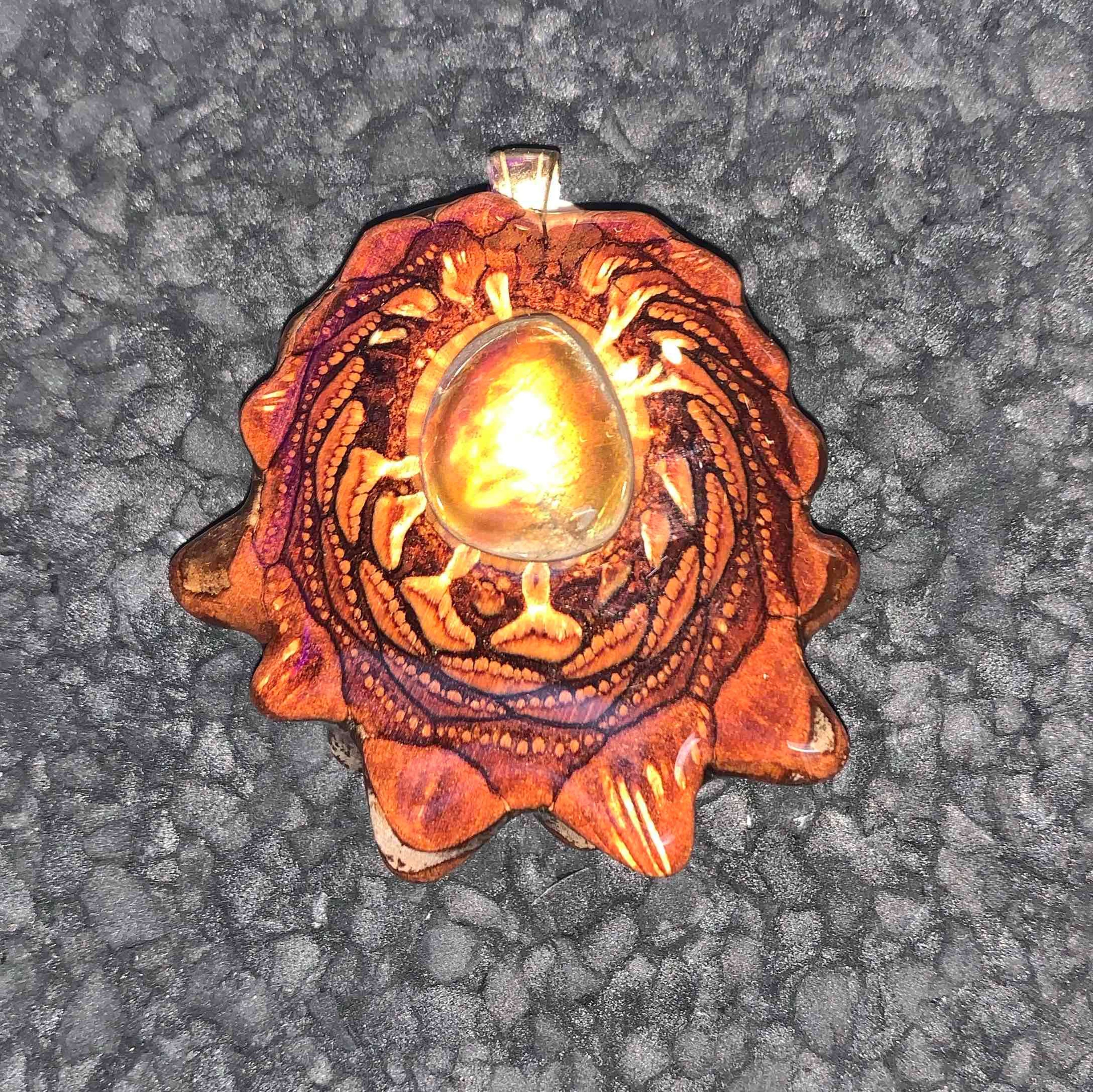 Preview pic of Third eye pinecone ammolite pendant 