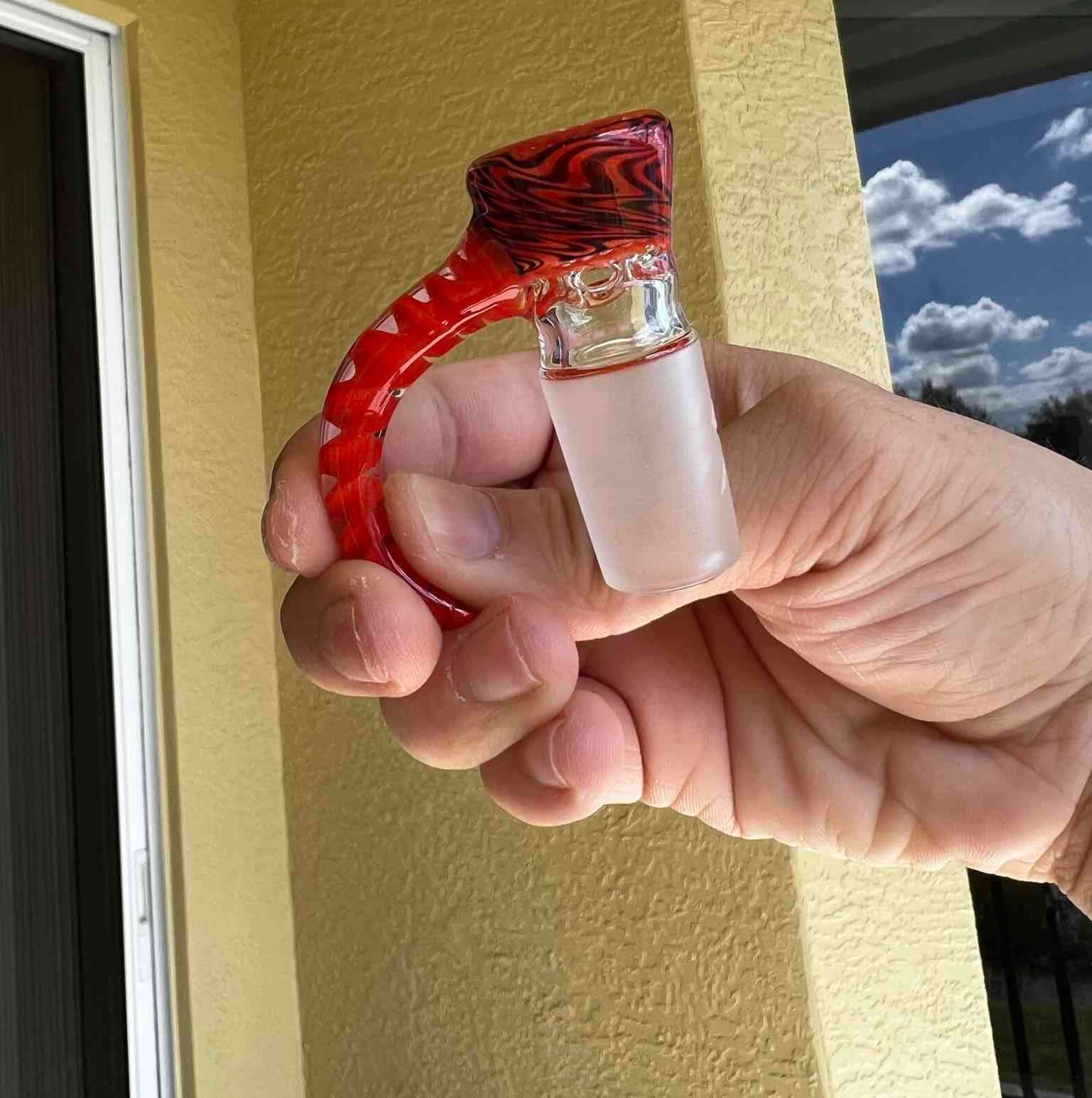 Preview pic of 18mm jet black over orange crayon