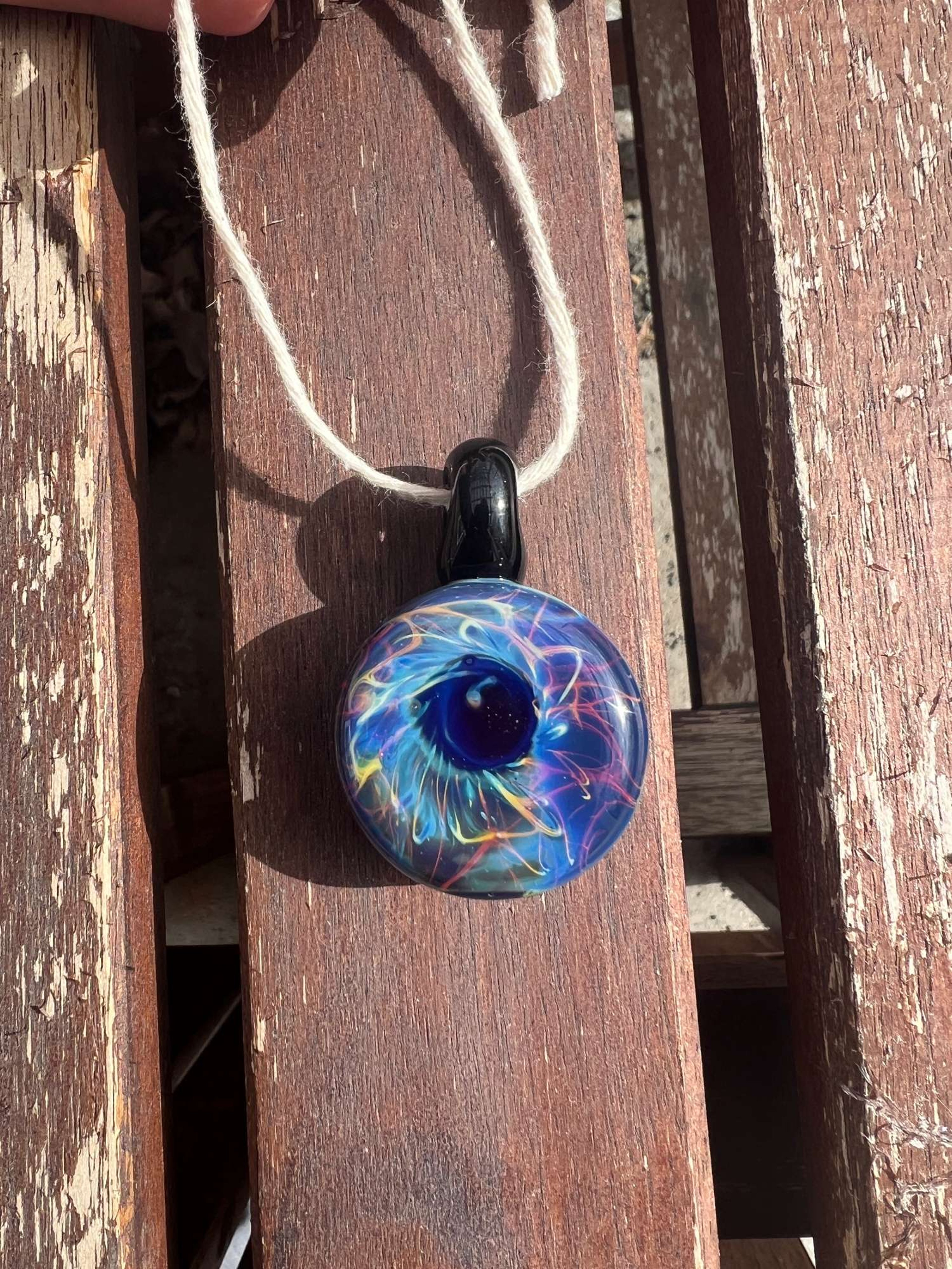Chaos encalmo pendant image 0