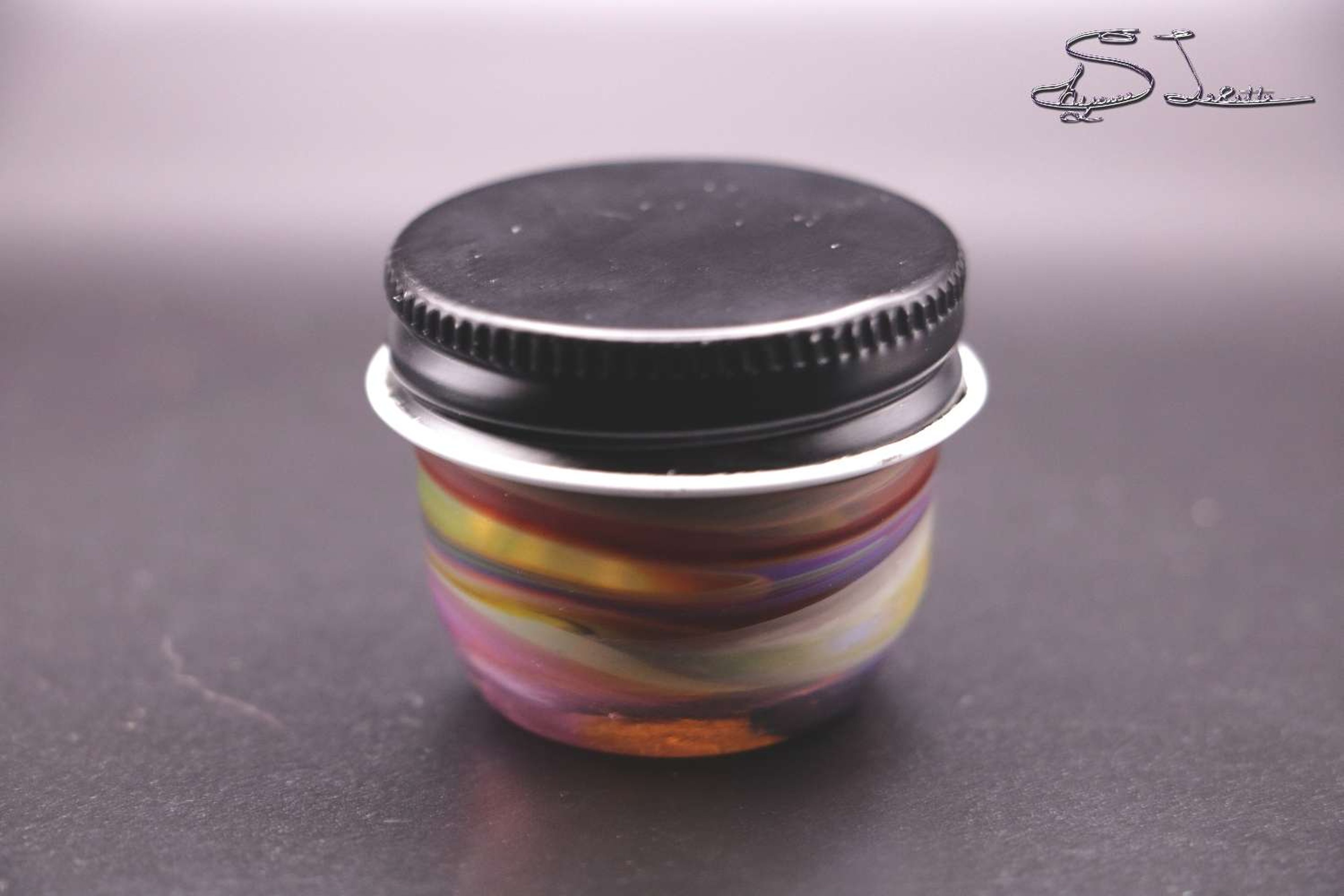Multi colored jar image 0