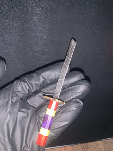 Preview pic of Damascus sword dabber