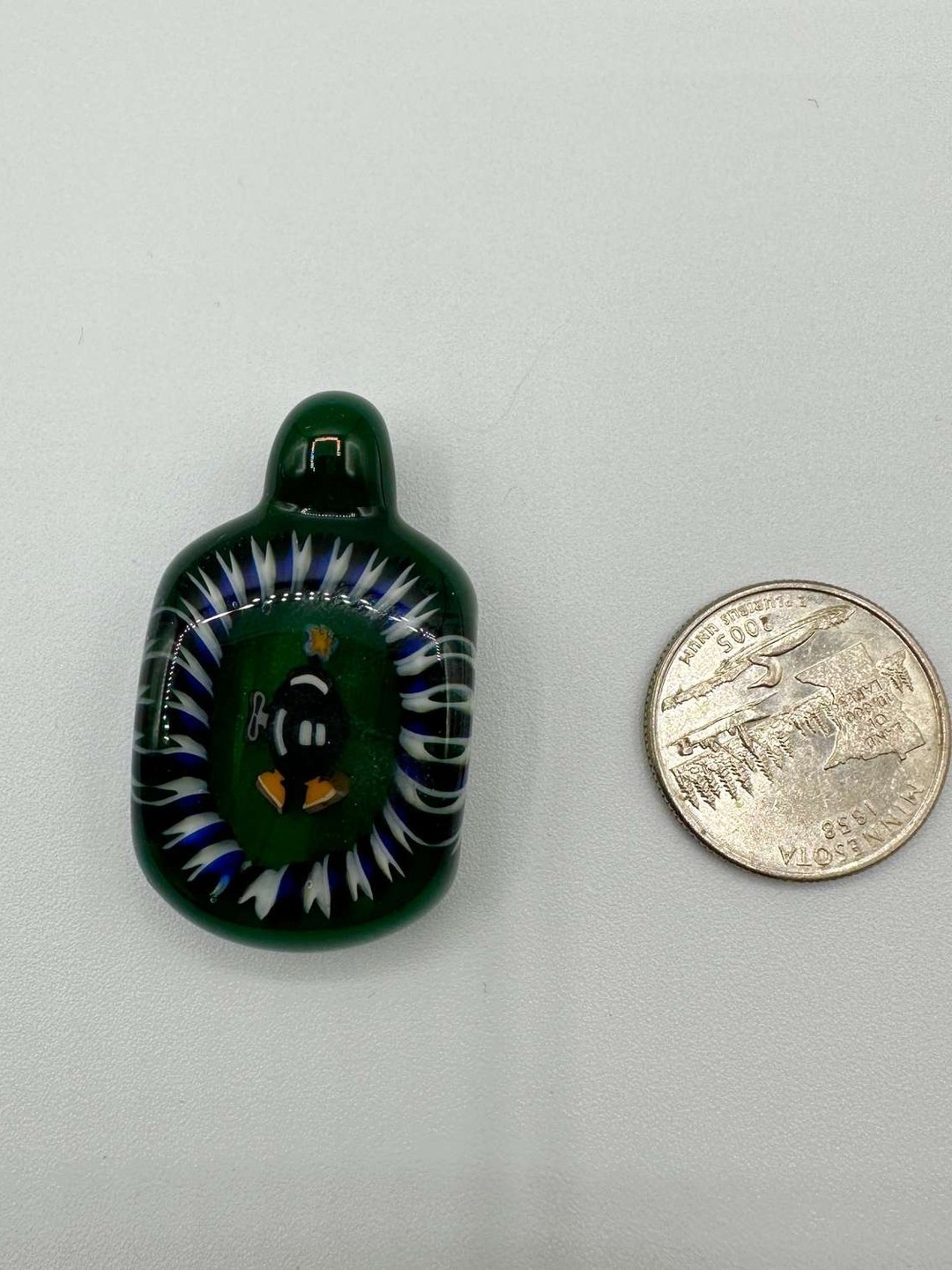 Micro Glass Bombomb Pendant Green Backing image 0