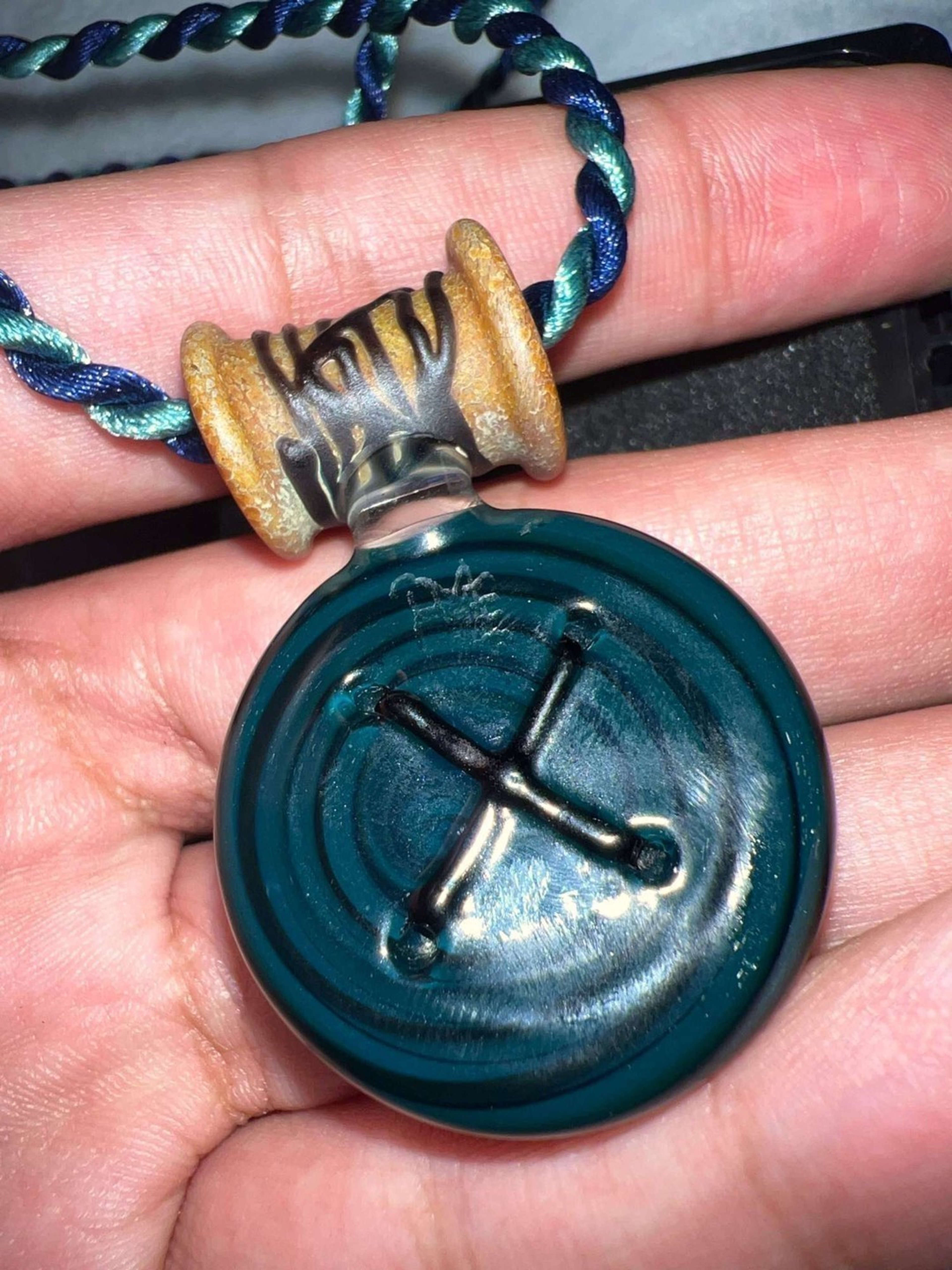 Preview pic of Muller eye button pendy shipped in peli!