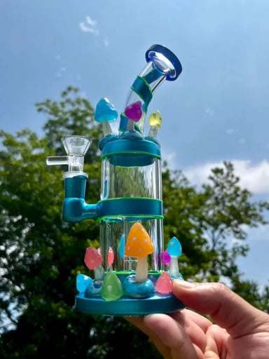 Preview pic of 9-Inch Transparent Blue Glass Rig Water Pipe Bong with Glow in the Dark Mushrooms and Lines

