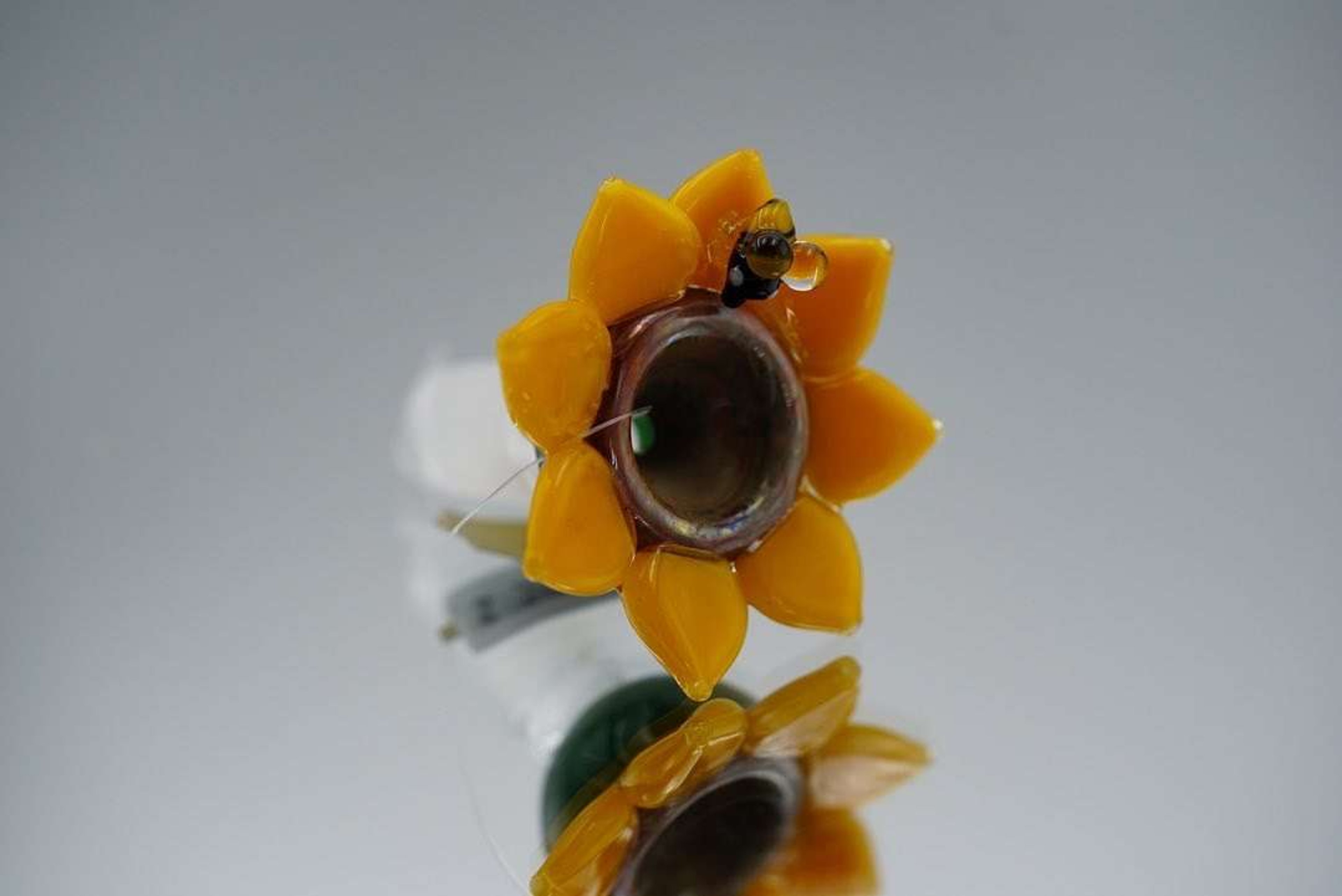 Empire glass work flower with bee slide image 0