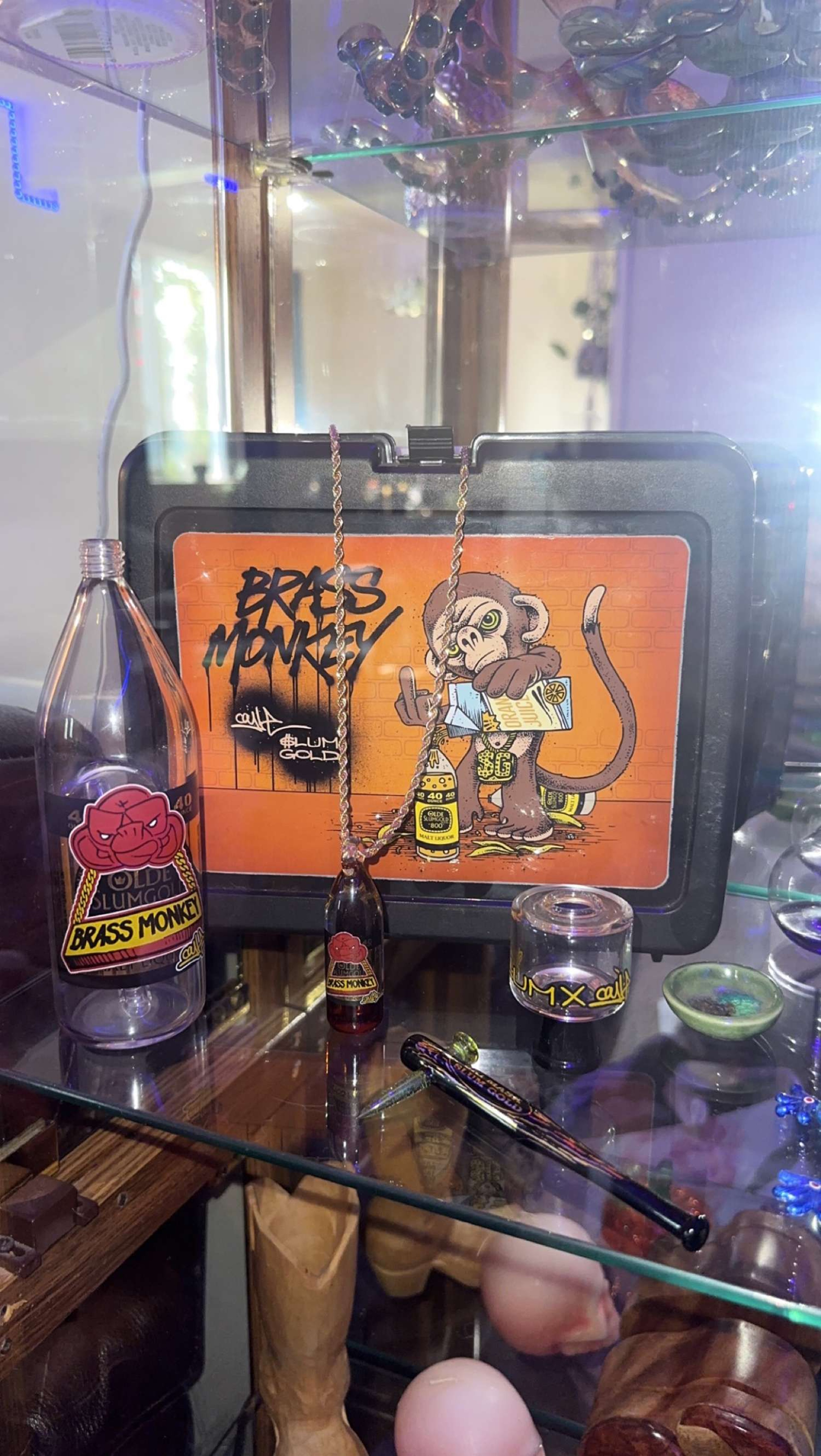 Preview pic of Ski mask X Coyle brass monkey Saki bottle