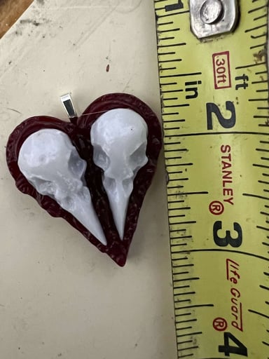 Preview pic of Raven skull heart pendant 