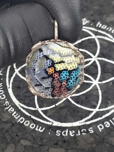 Preview pic of Faceted and wrapped pendant by Kaj beck
