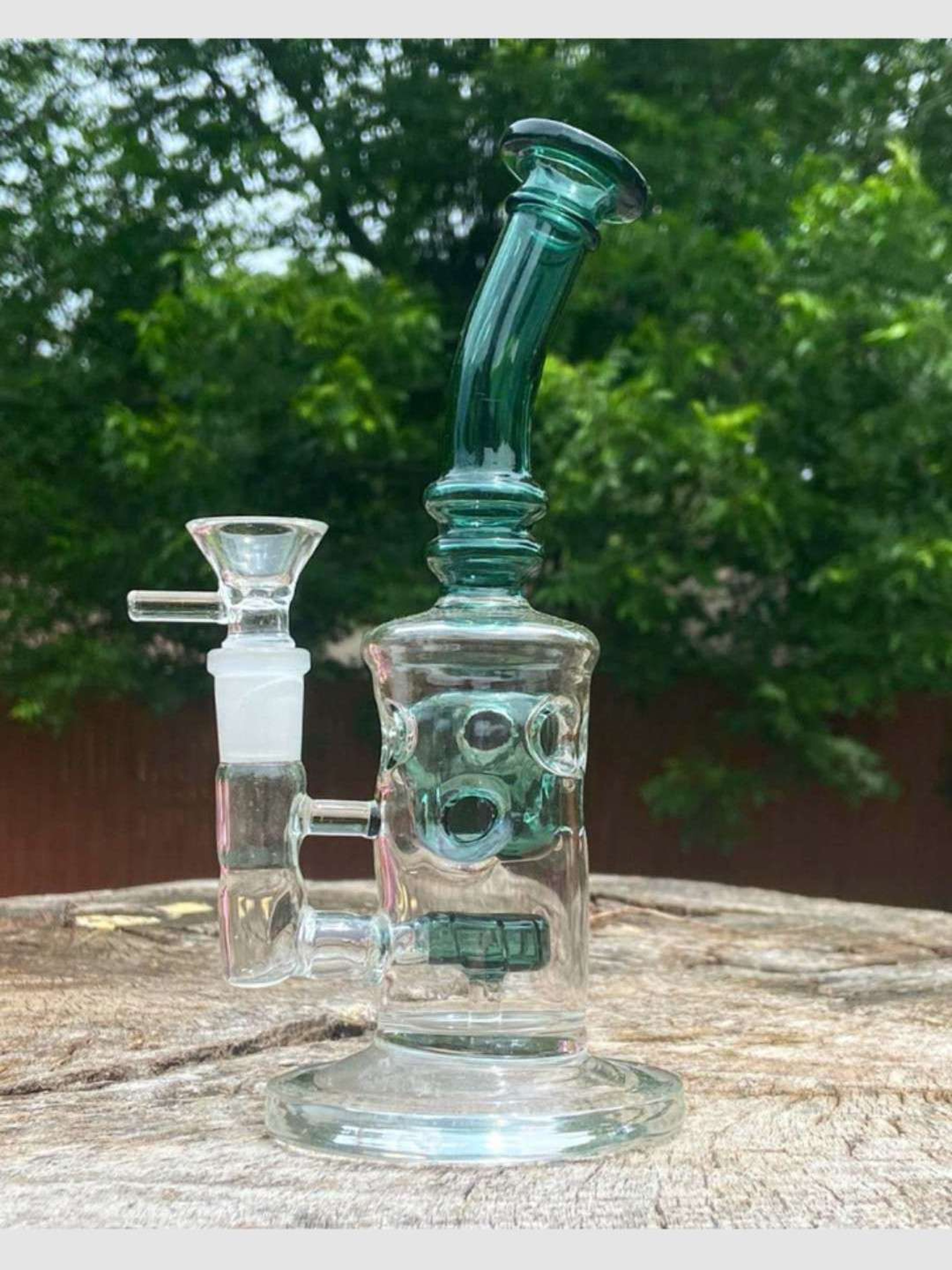 8" Swiss cheese Glass Recycler Rig
image 0
