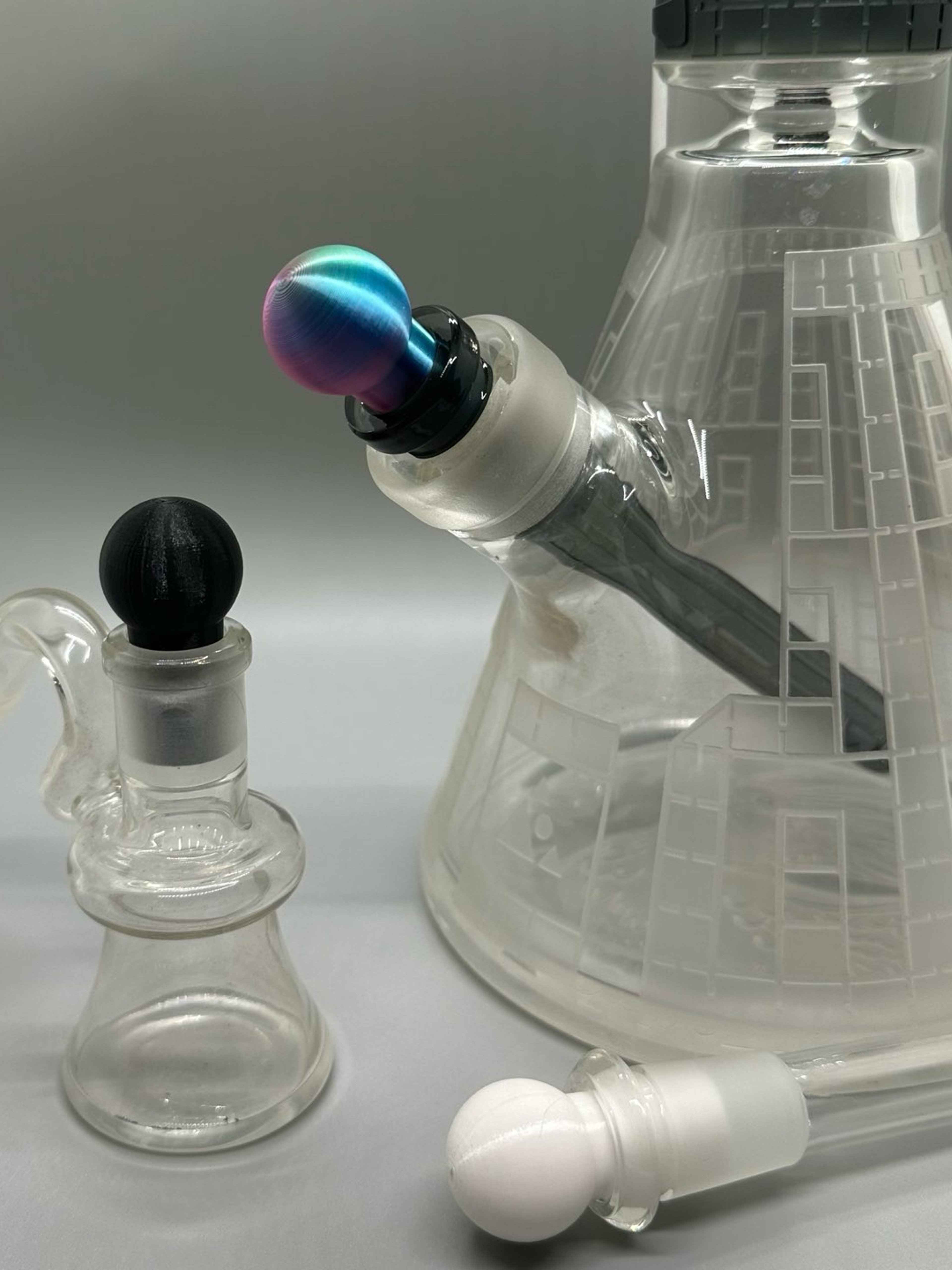 Preview pic of Glass Maintenance 3-Pack: 14mm 3D Printed Cleaning Plugs for Bongs, Dab Rigs, and Downstems