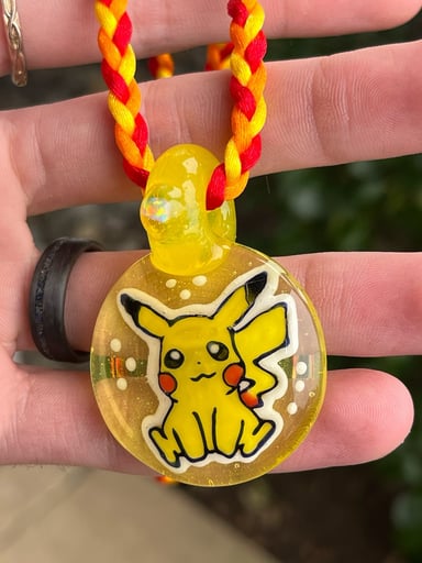 Preview pic of Avi Glass UV Pikachu Pendant w/ Encased Opal