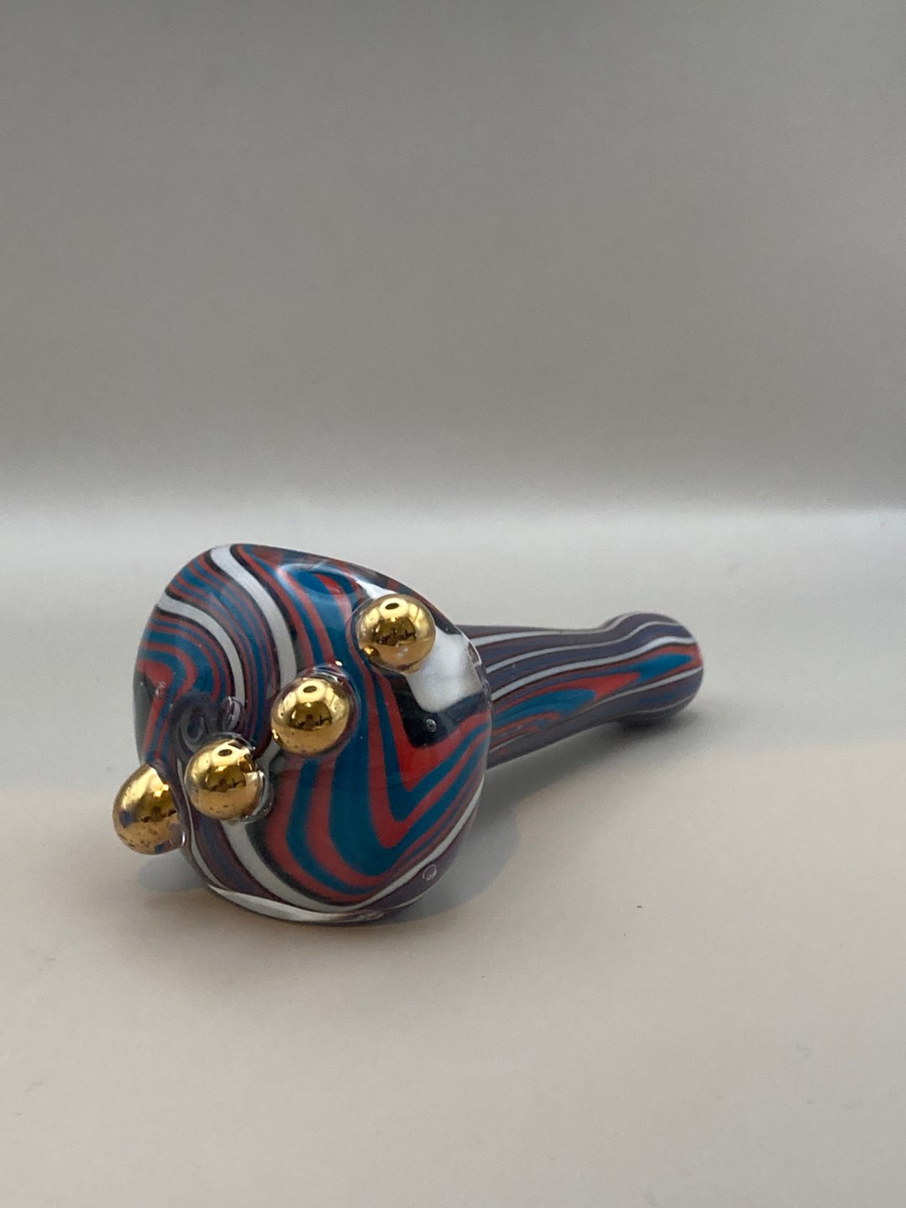 Line tubing pipe with gold marbles image 0