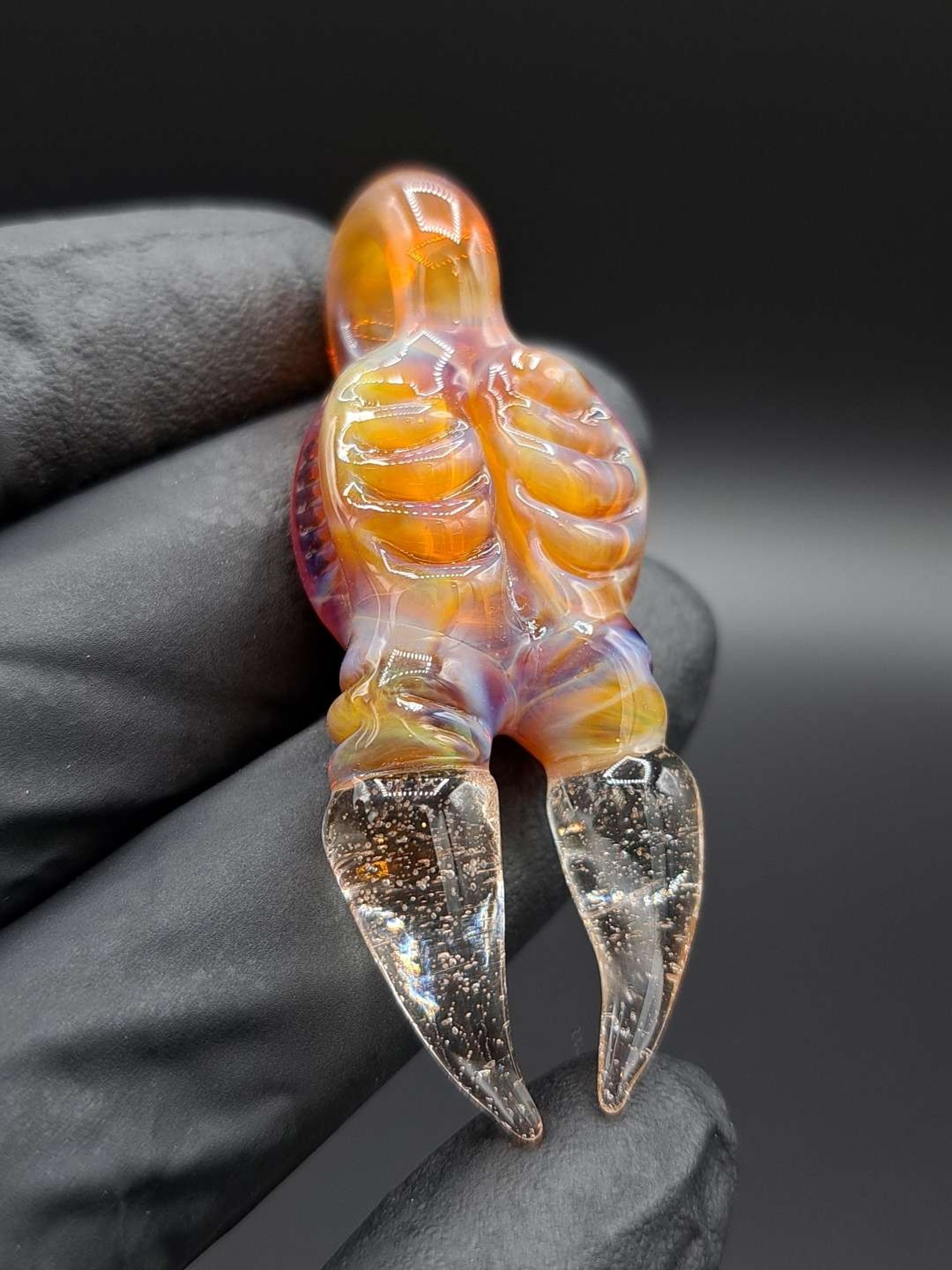 Preview pic of Carved pendant UV claws