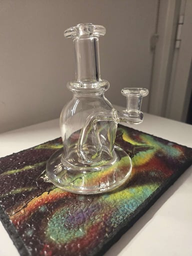 Preview pic of Beautiful hollow foot loon 95° 10mm with a opal encased on the bottom of the perc