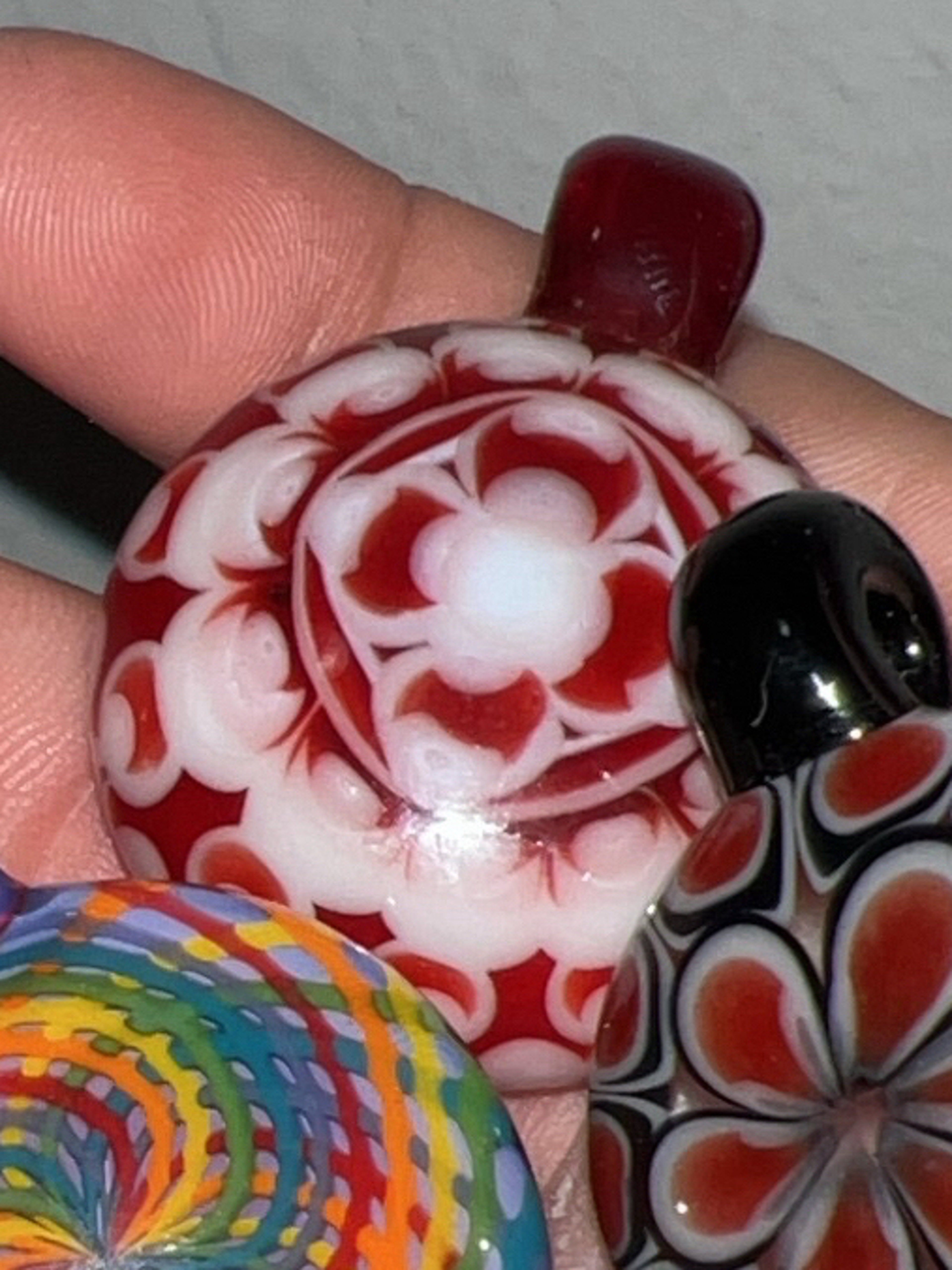 Preview pic of white and red dot stack pendy