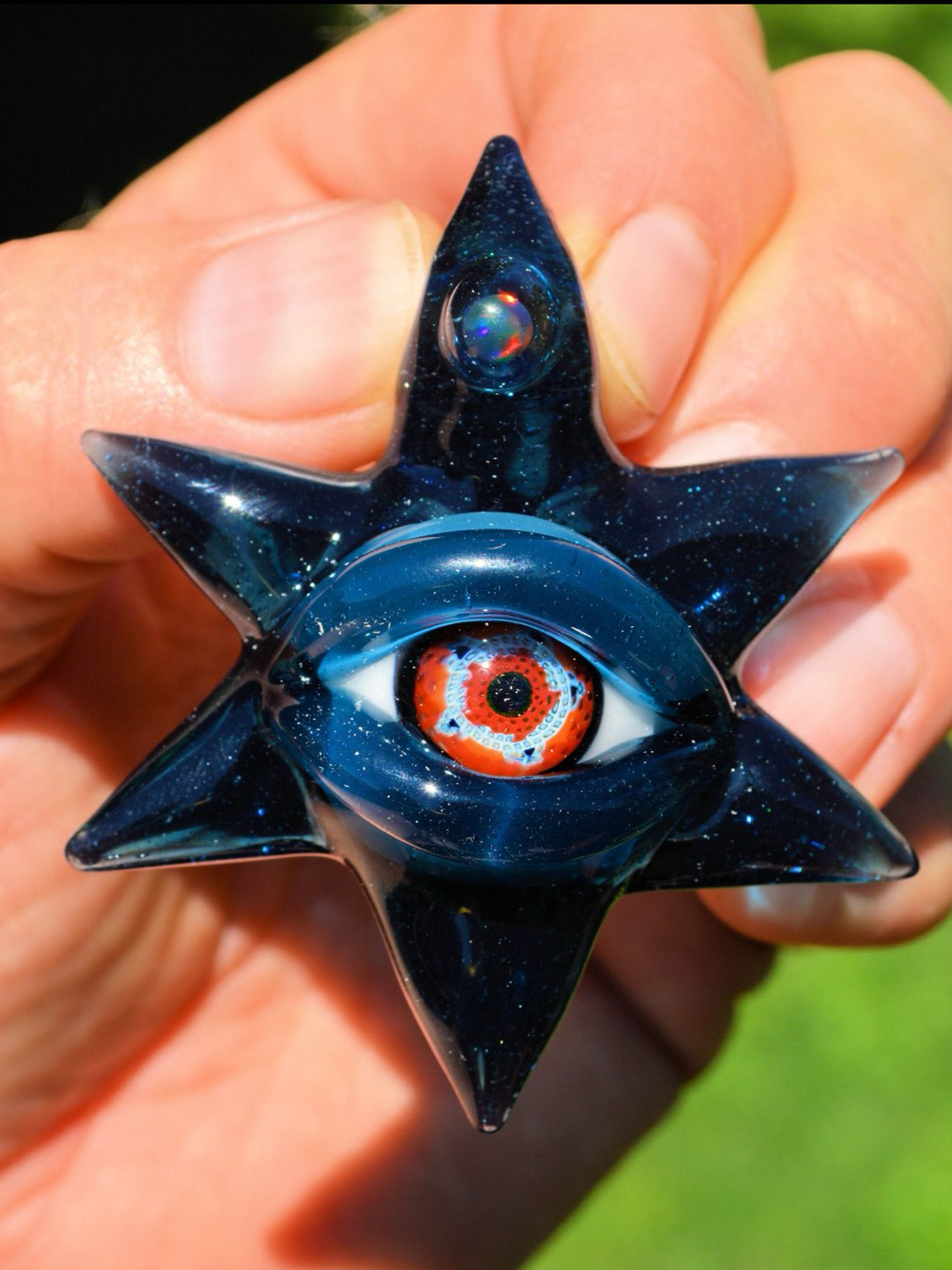 Preview pic of Patrick entenmann star eye pendant