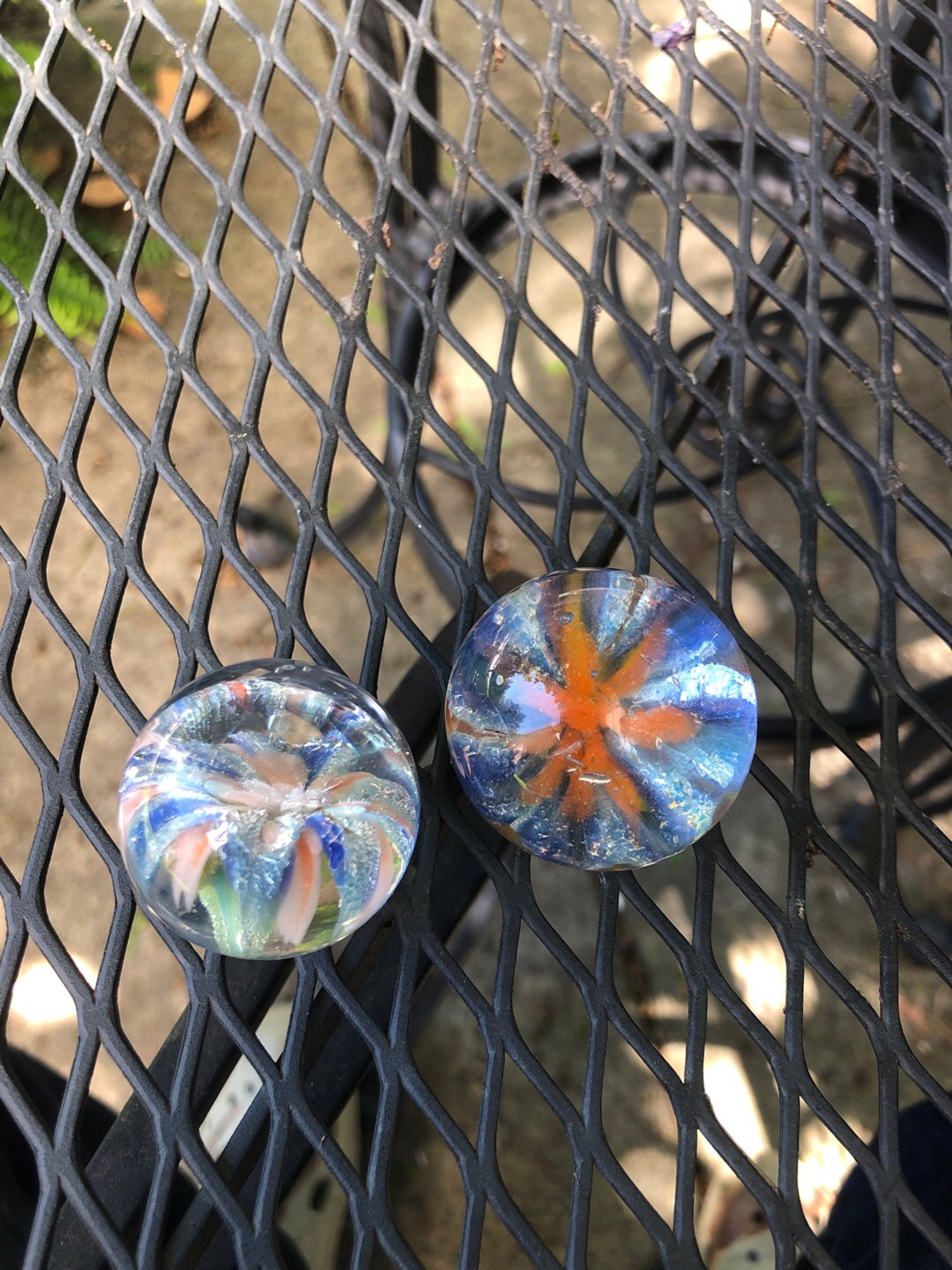 Preview pic of Two blue flower marbles