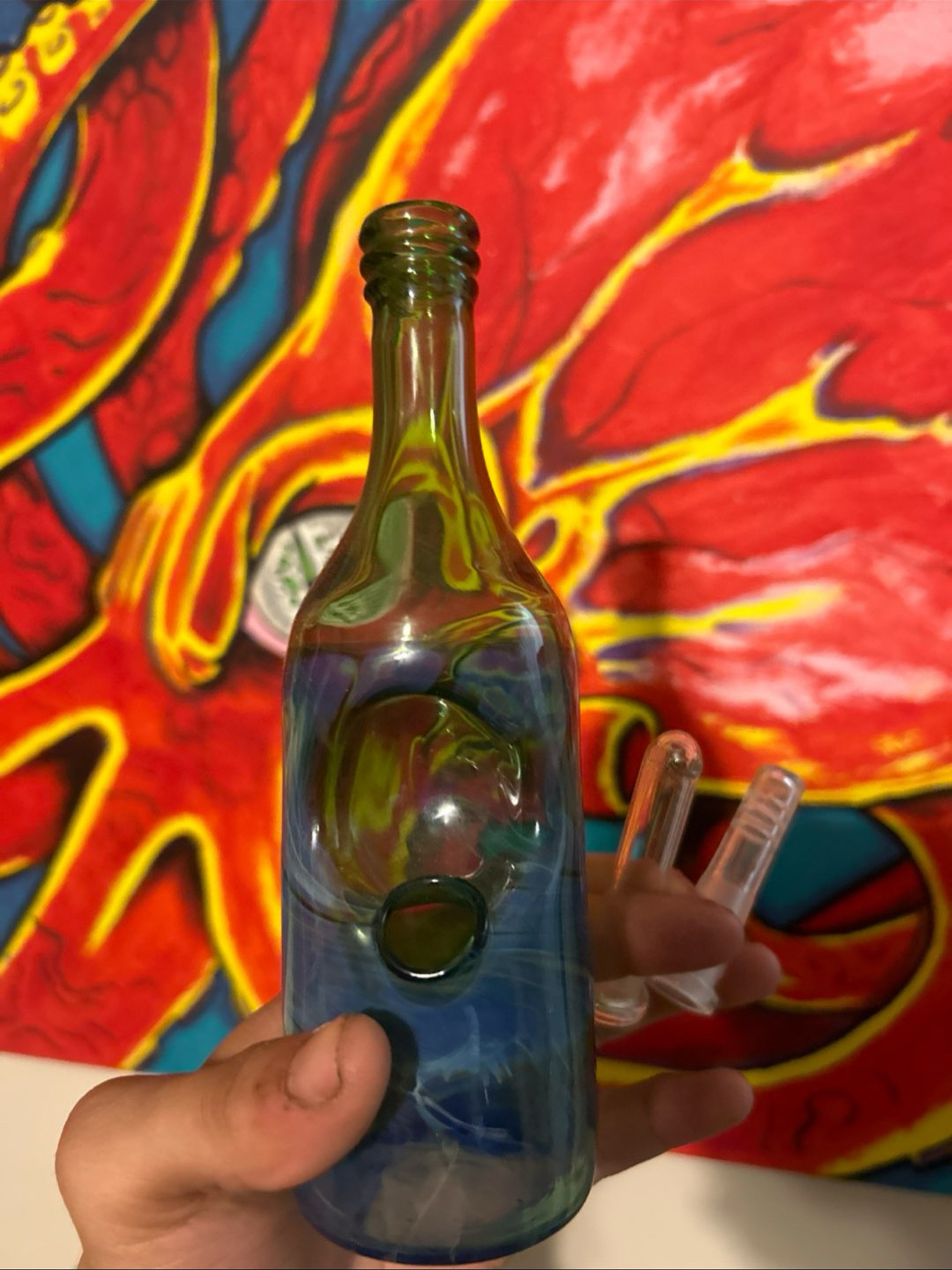 Preview pic of Muti colored saki bottle shifts in the right light