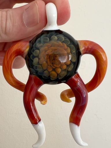 Preview pic of Four Winds Flameworks Horned implosion pendant