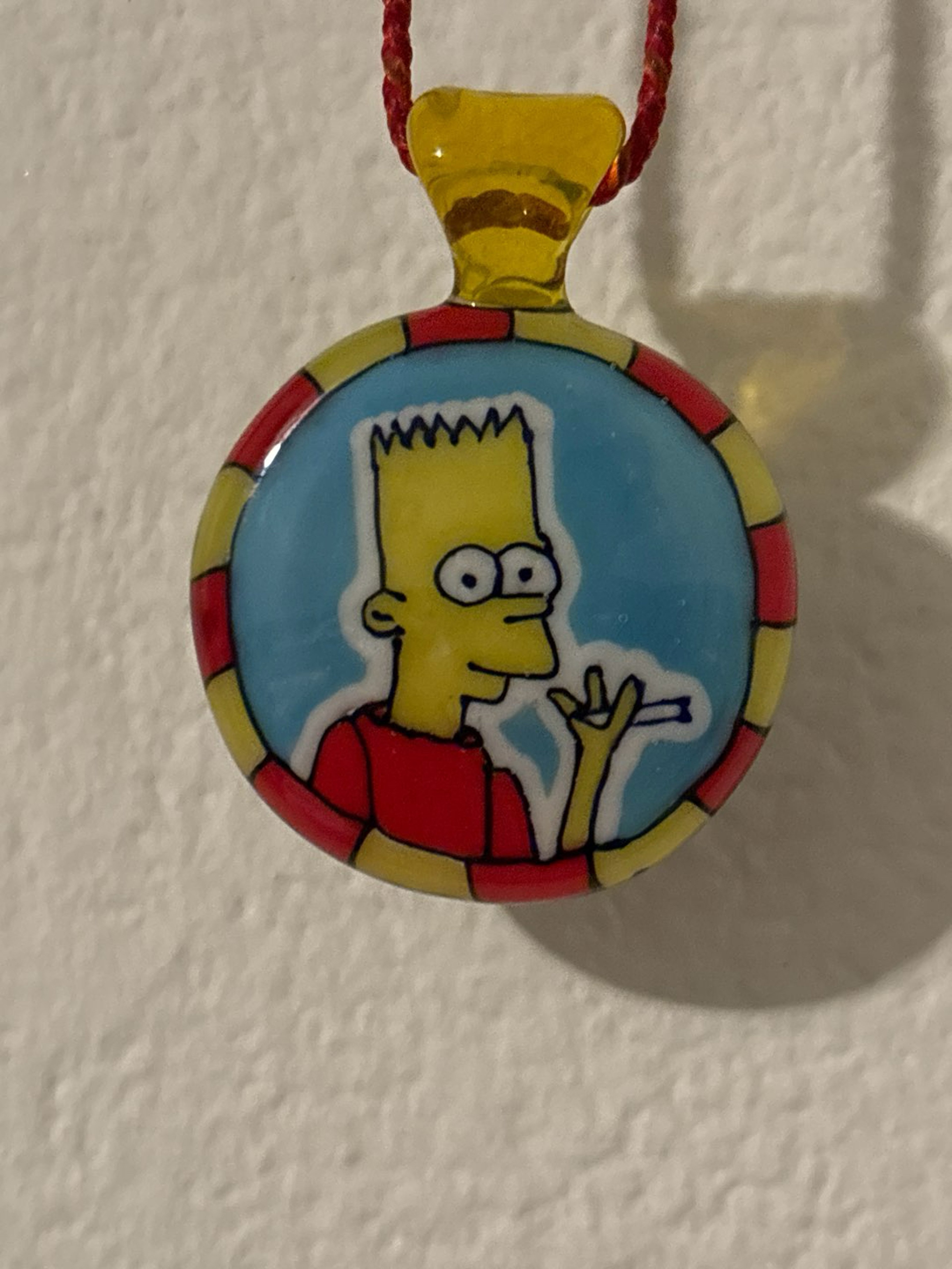 Preview pic of Takoda Madrona “Eat my shorts” pendant