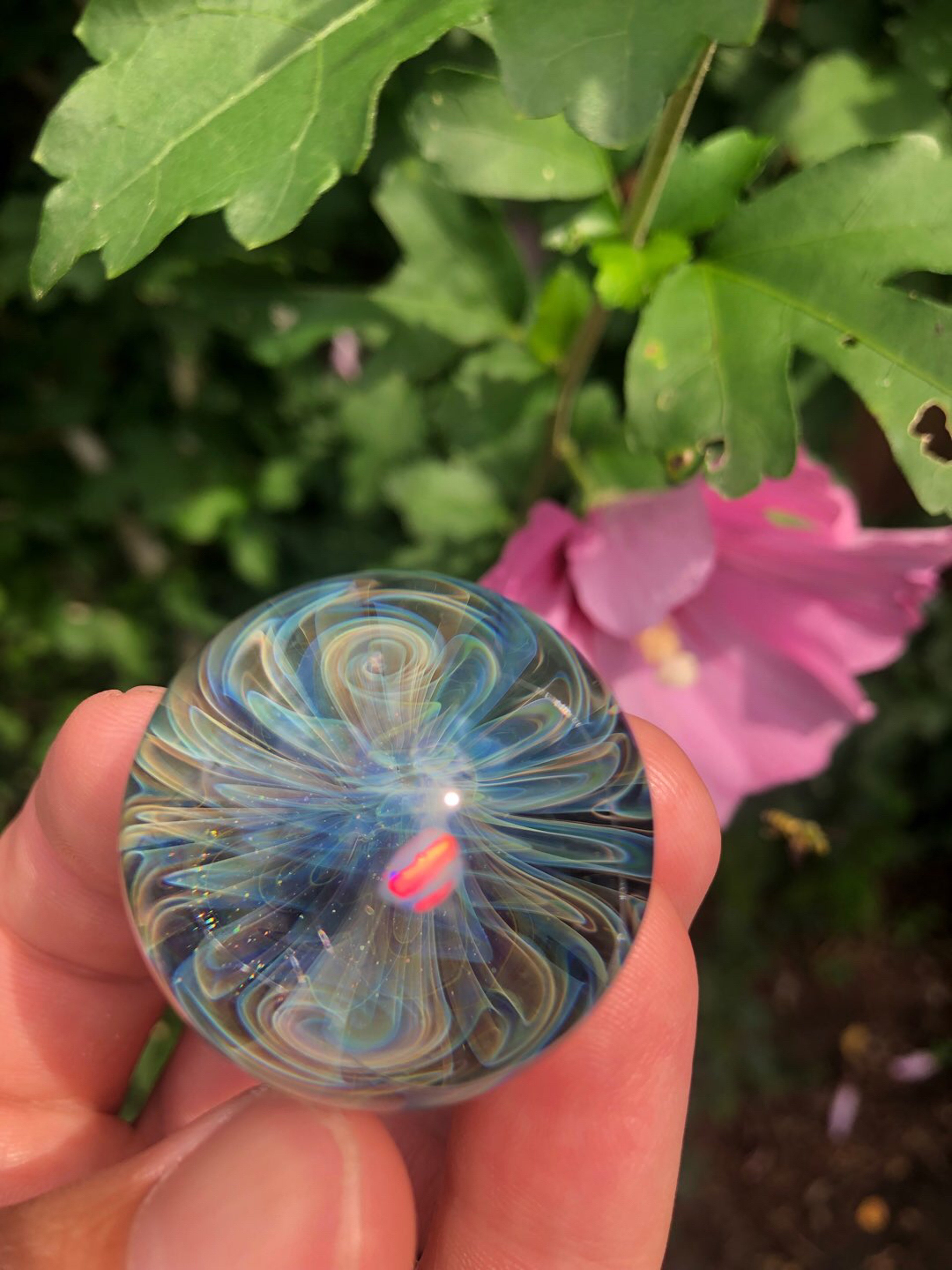Preview pic of Silver fume wigwag marble with tumbled opal