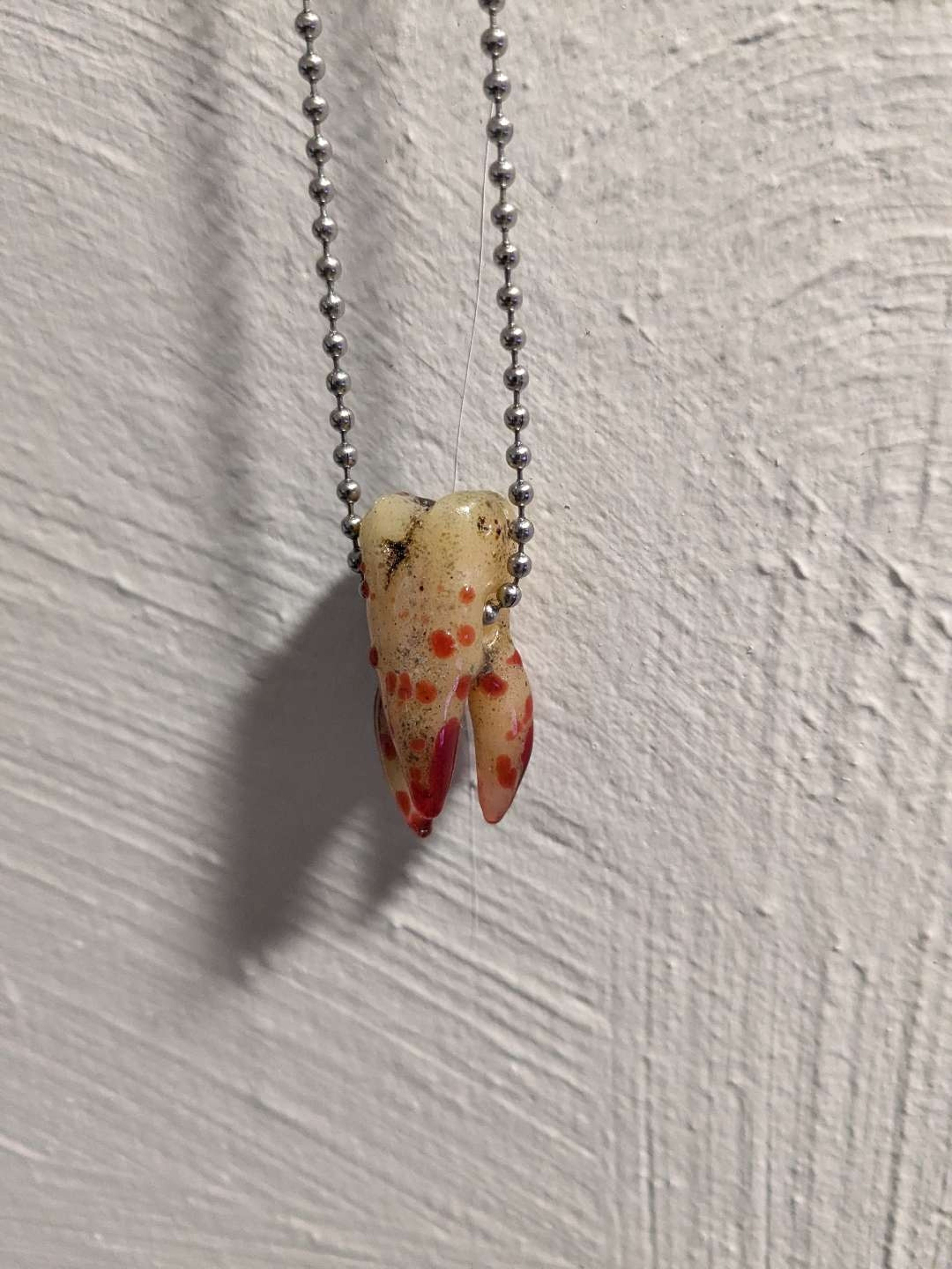 Bloody tooth image 0