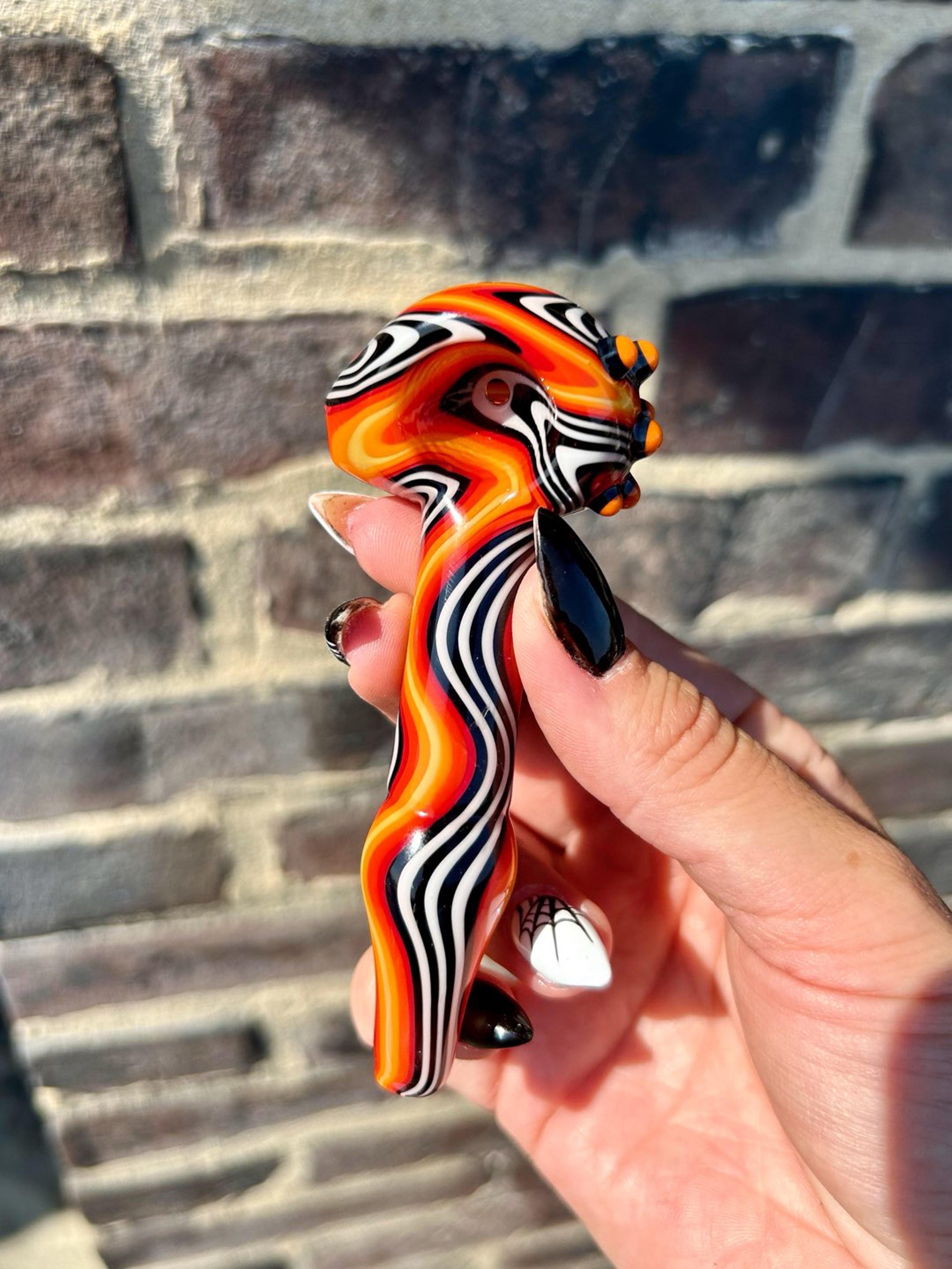 Preview pic of Black, White, Orange, Yellow Spoon