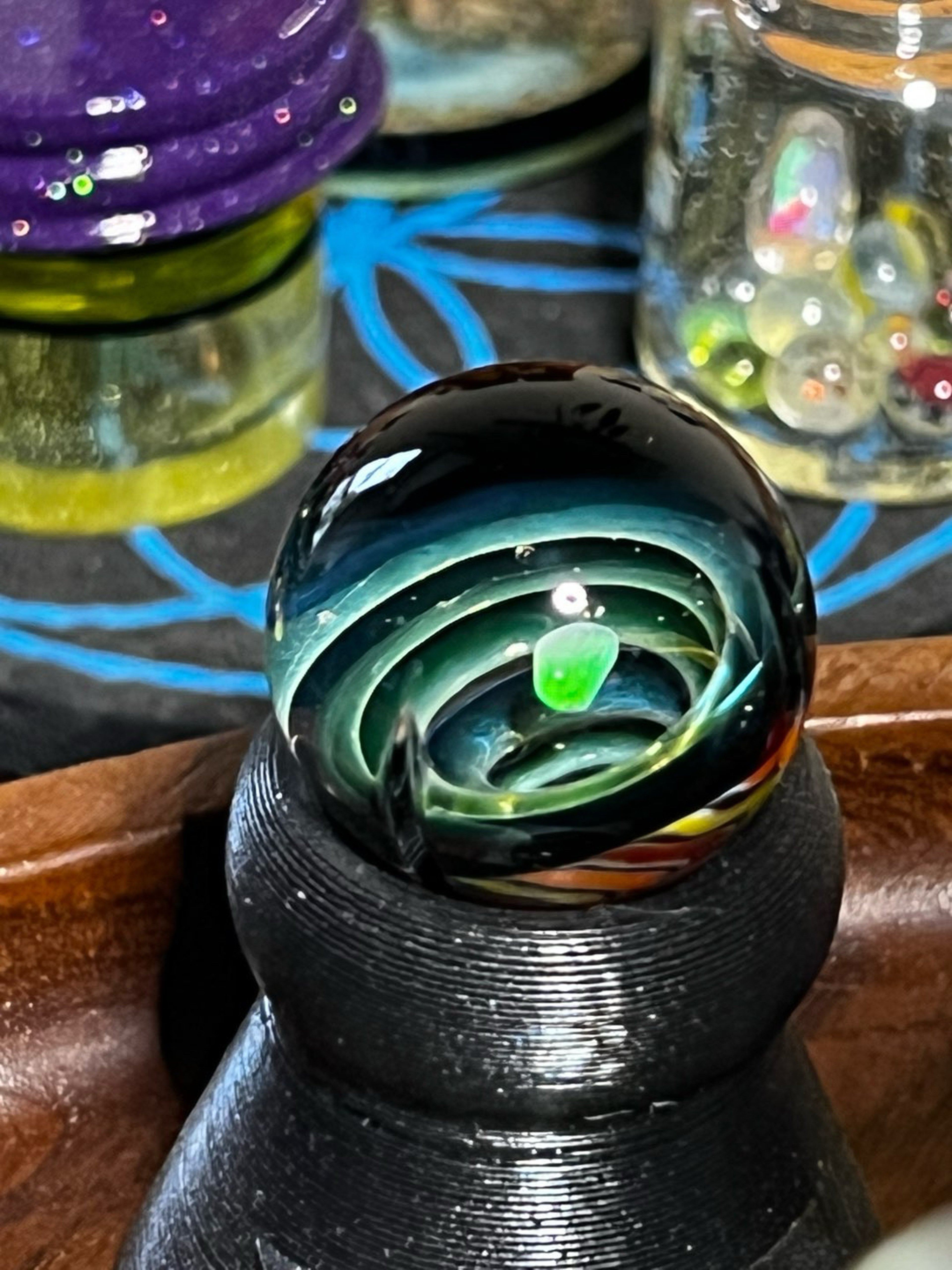 Preview pic of UV reactive floating opal vortex spinner marble signed