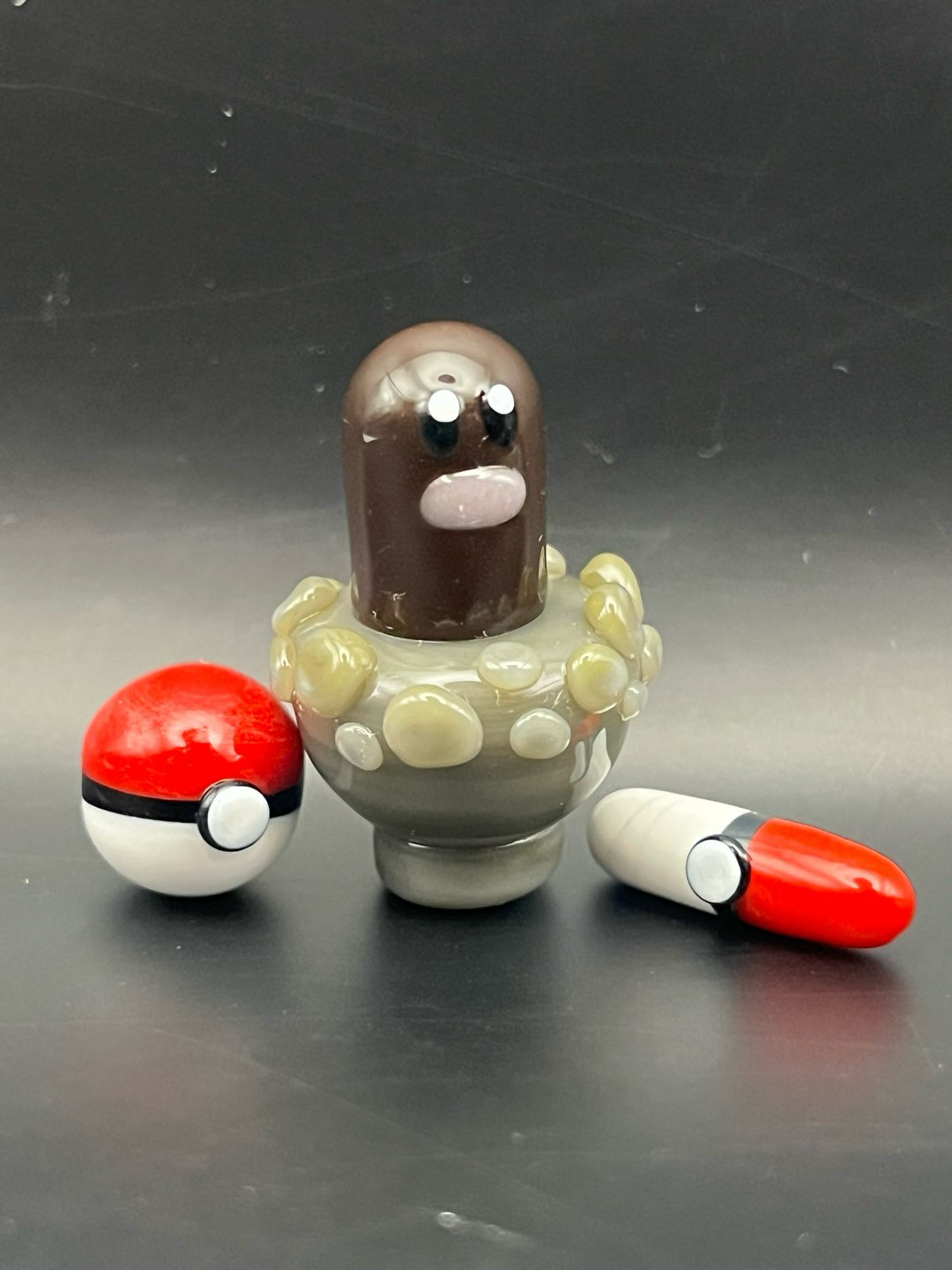 Preview pic of Pokémon Diglett Pokeball Slurper Set