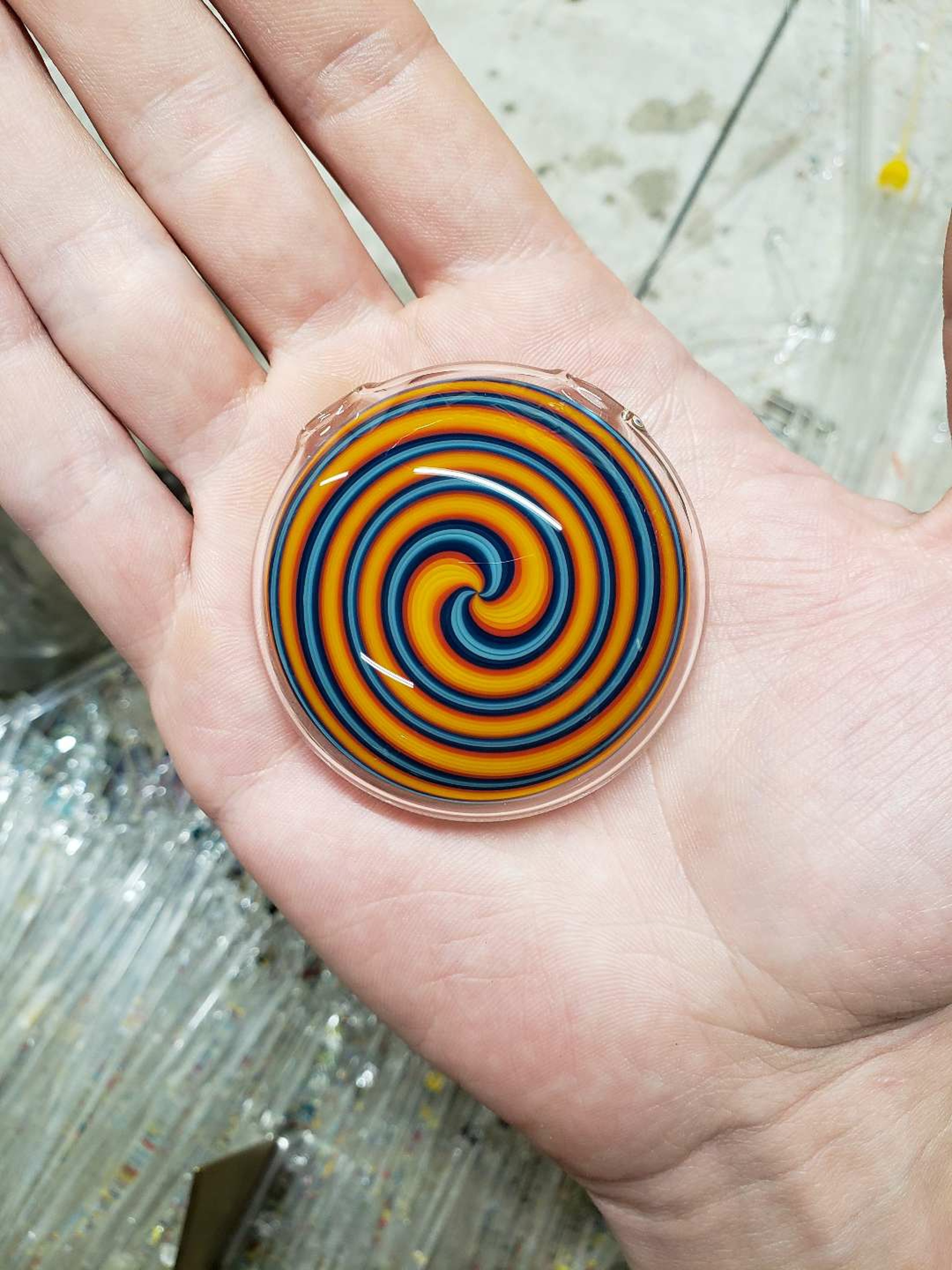 Blue and Orange hollow Spiral disc pendant image 0