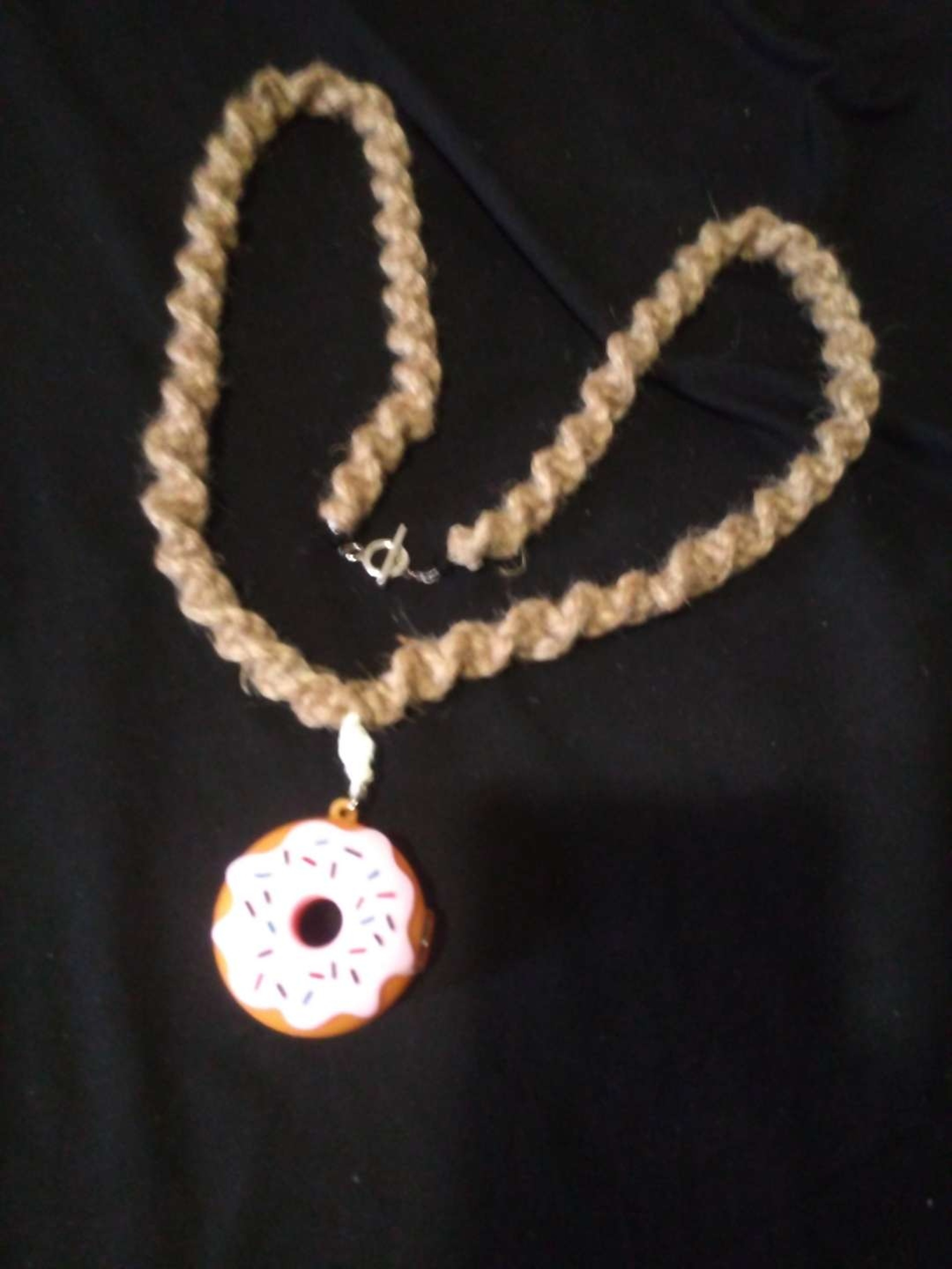 Preview pic of Pink silicone donut chillum necklace