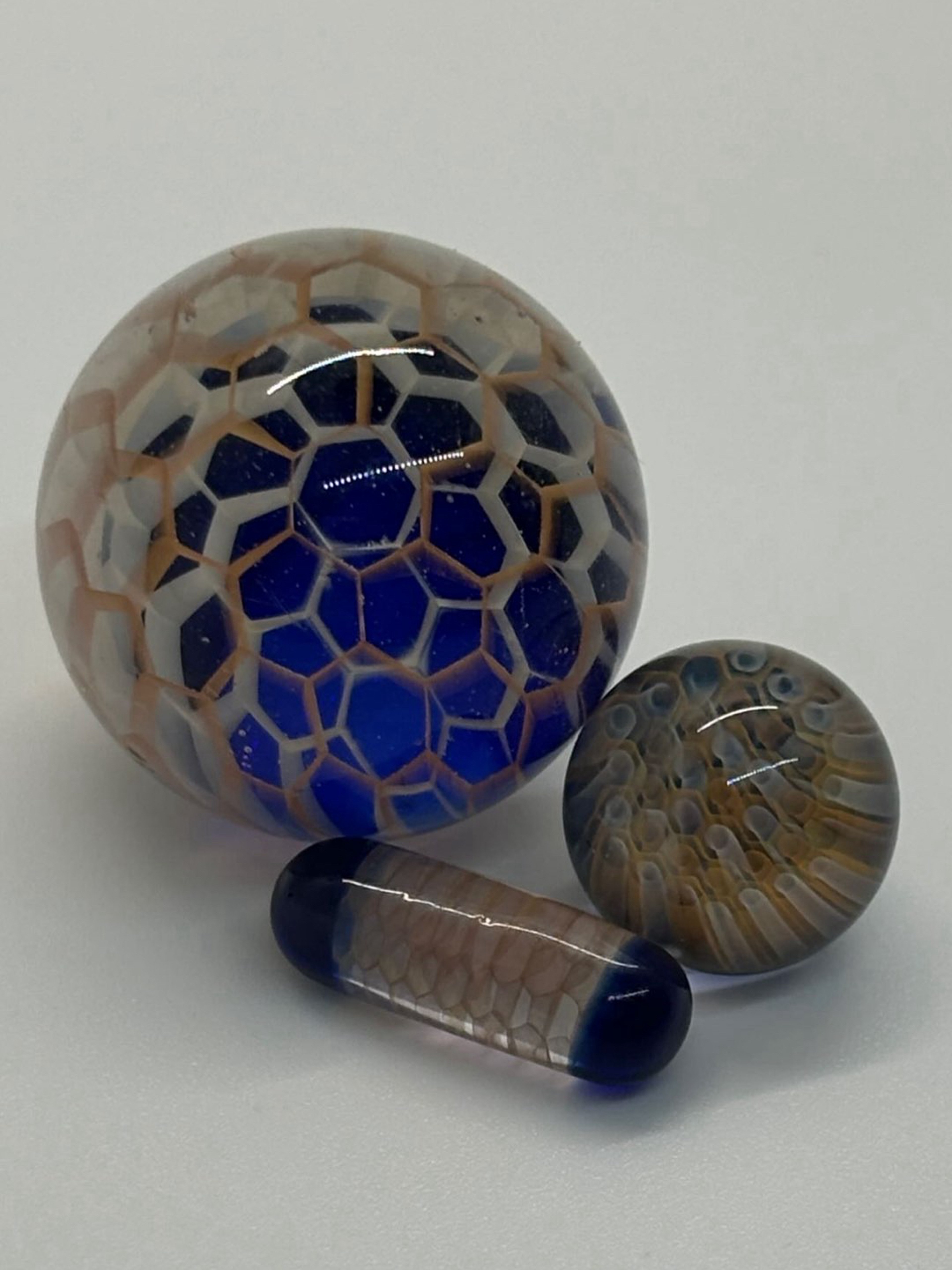 Preview pic of Teurfs glass silver and gold fume honeycomb marble slurper set
