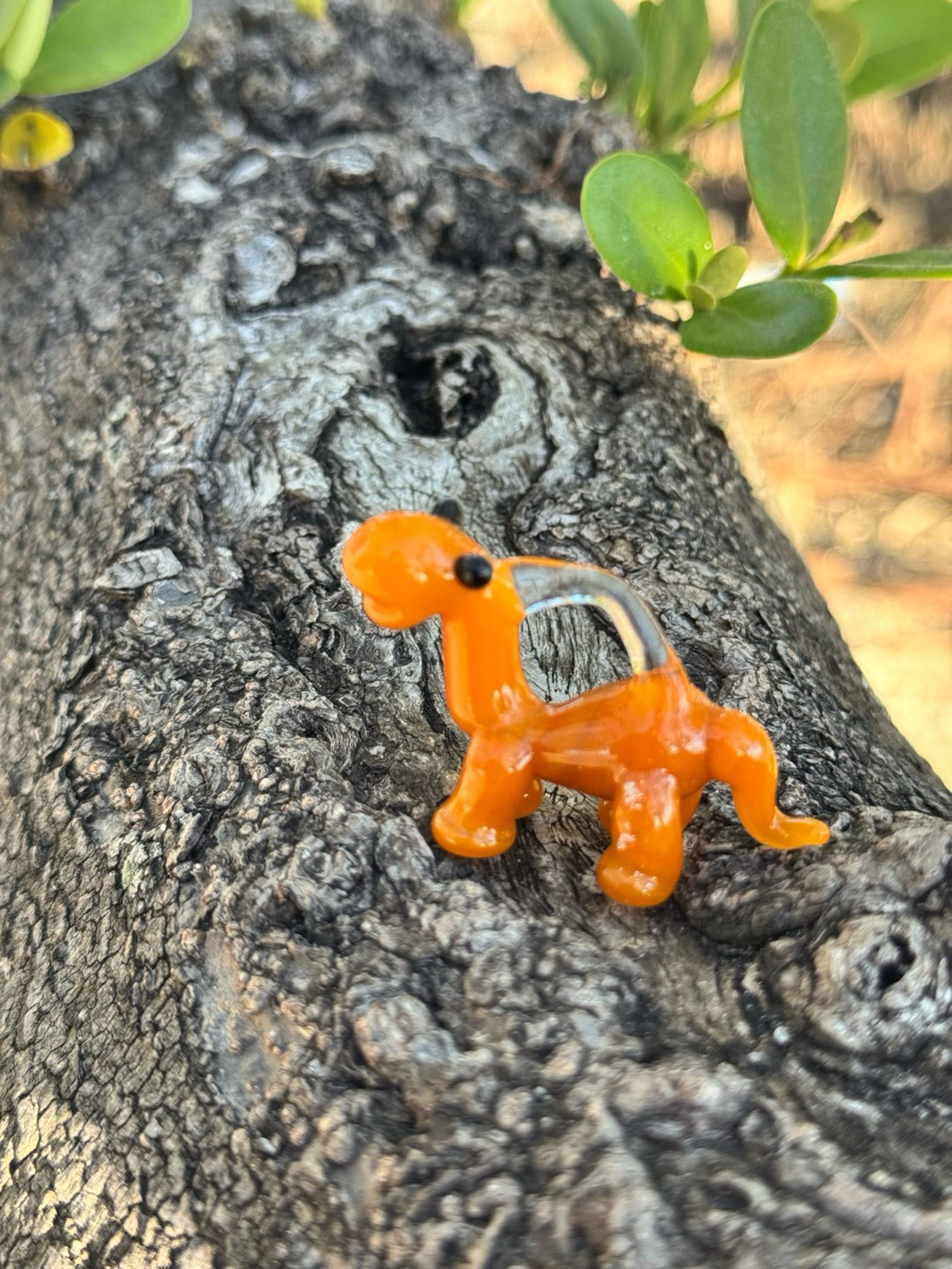 Preview pic of Dinosaur pendant orange