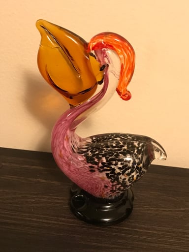 Preview pic of hand blown vintage glass pelican sculpture with fish in mouth