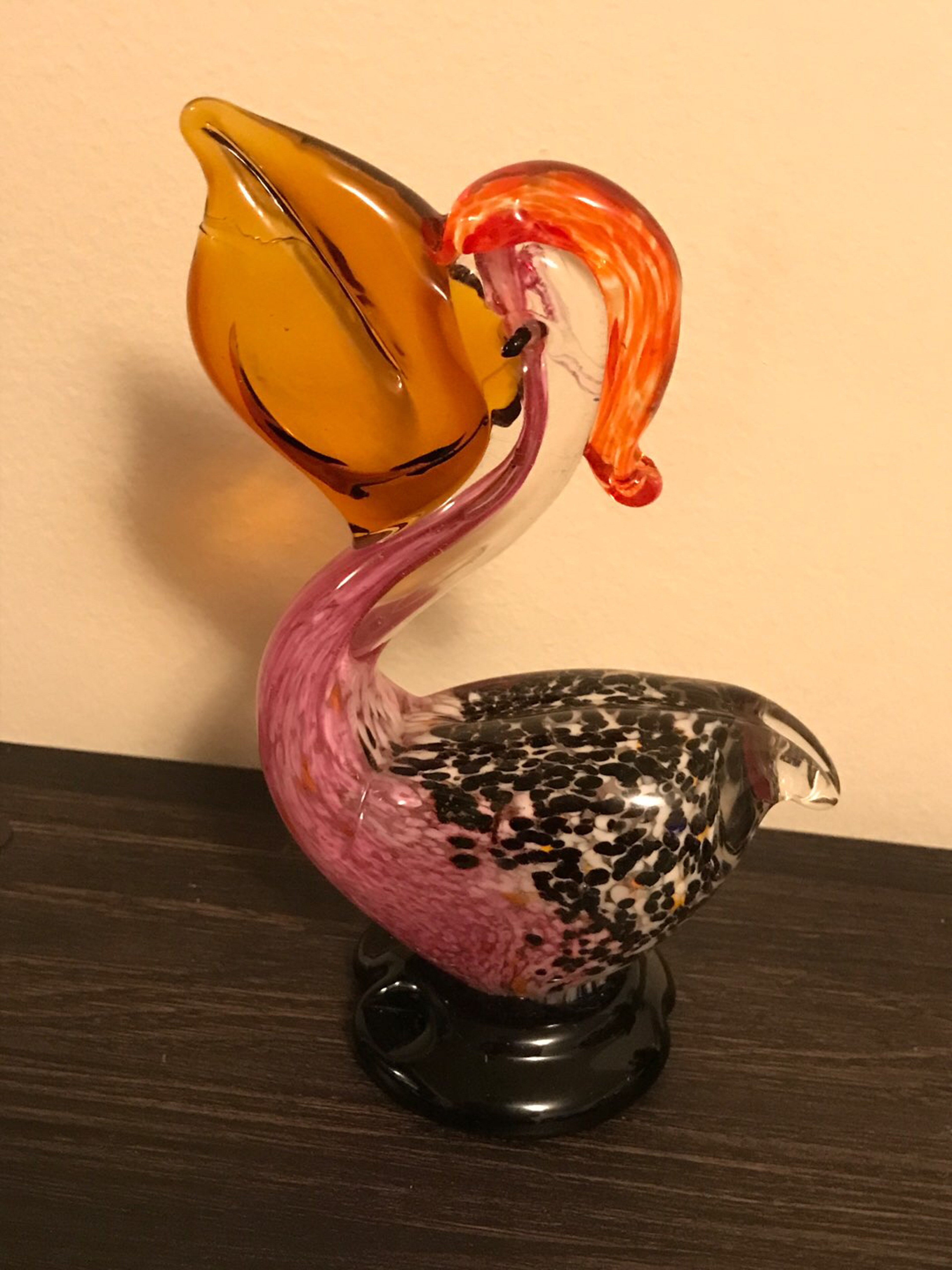 hand blown vintage glass pelican sculpture with fish in mouth image 0