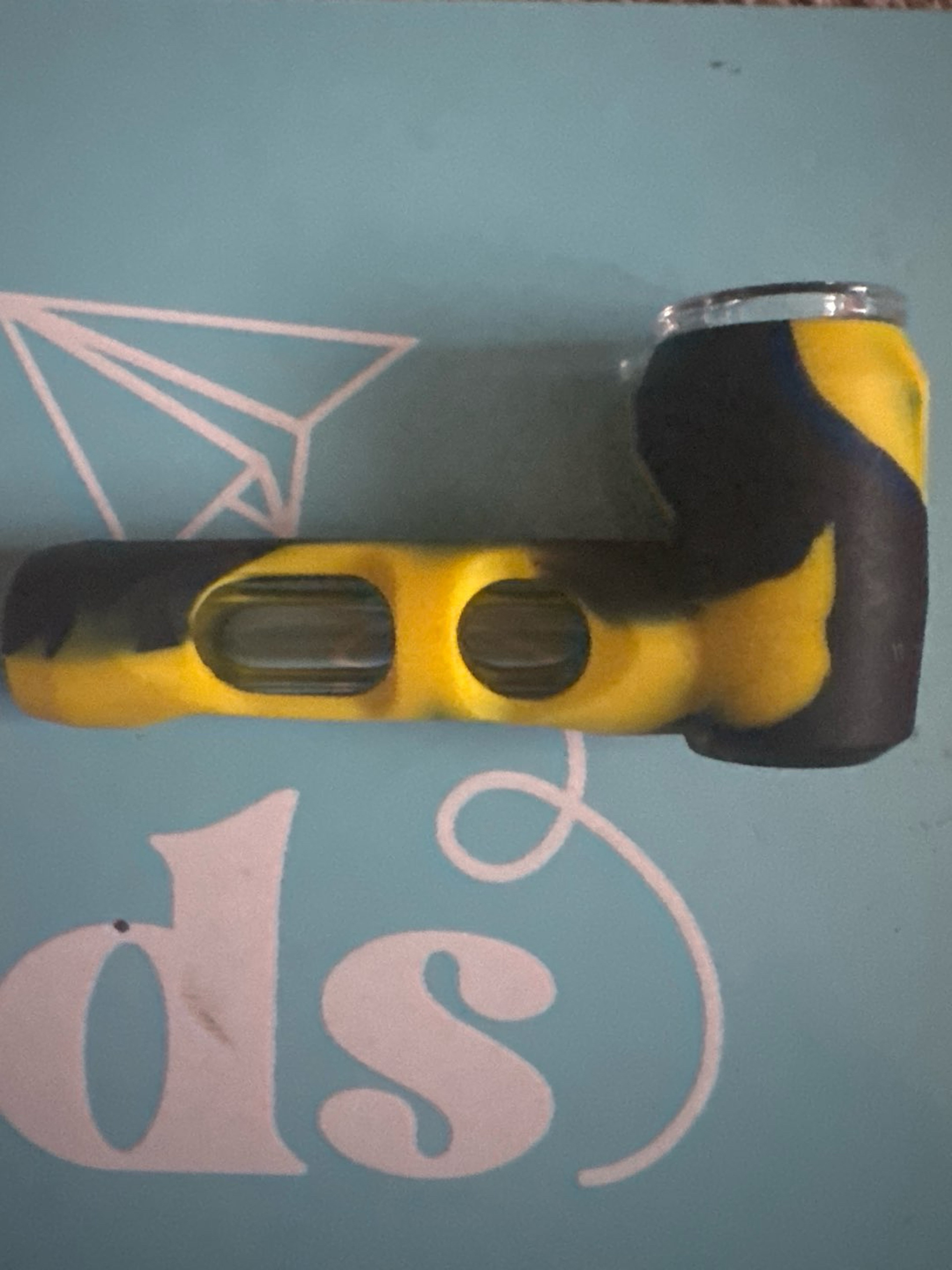 Preview pic of Black and yellow silicone covered glass spoon