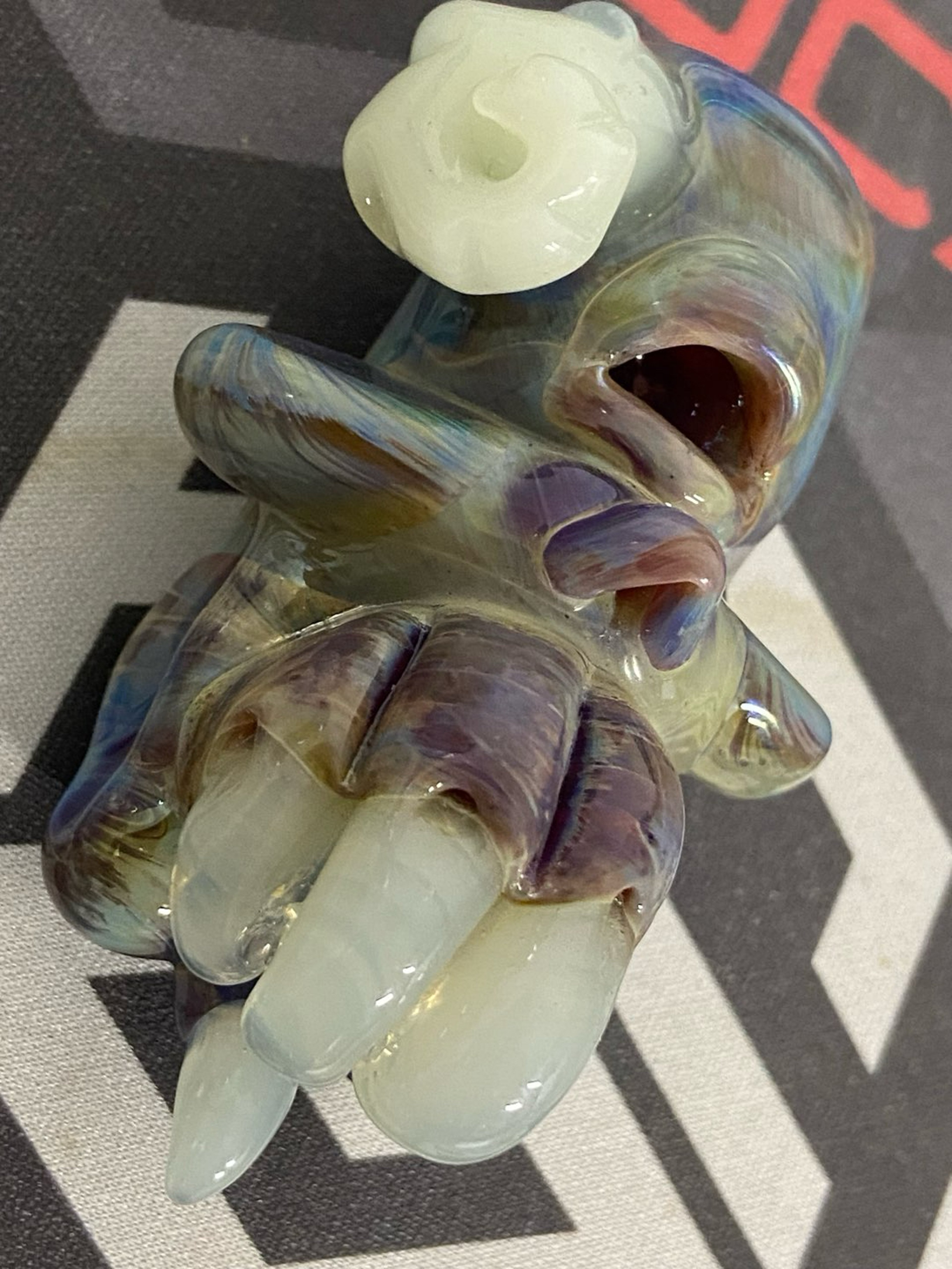 Preview pic of Striking Amber Purple Heady One Eye Cyclops Skull Pendant, UV Glowing Teeth/horn