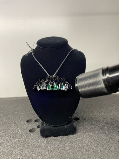 Preview pic of Zii x Carlson UV Grillz Pendant