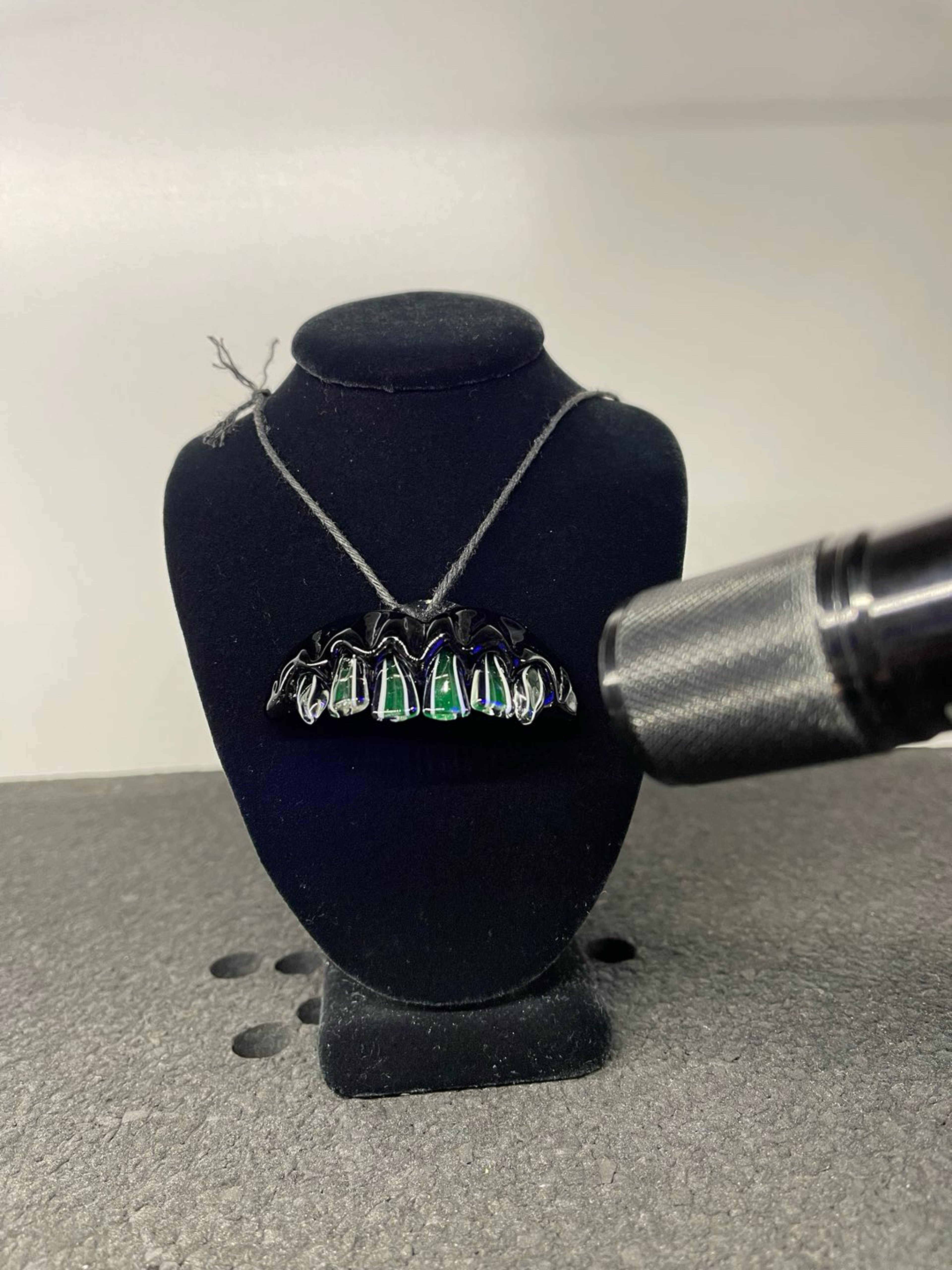 Preview pic of Zii x Carlson UV Grillz Pendant