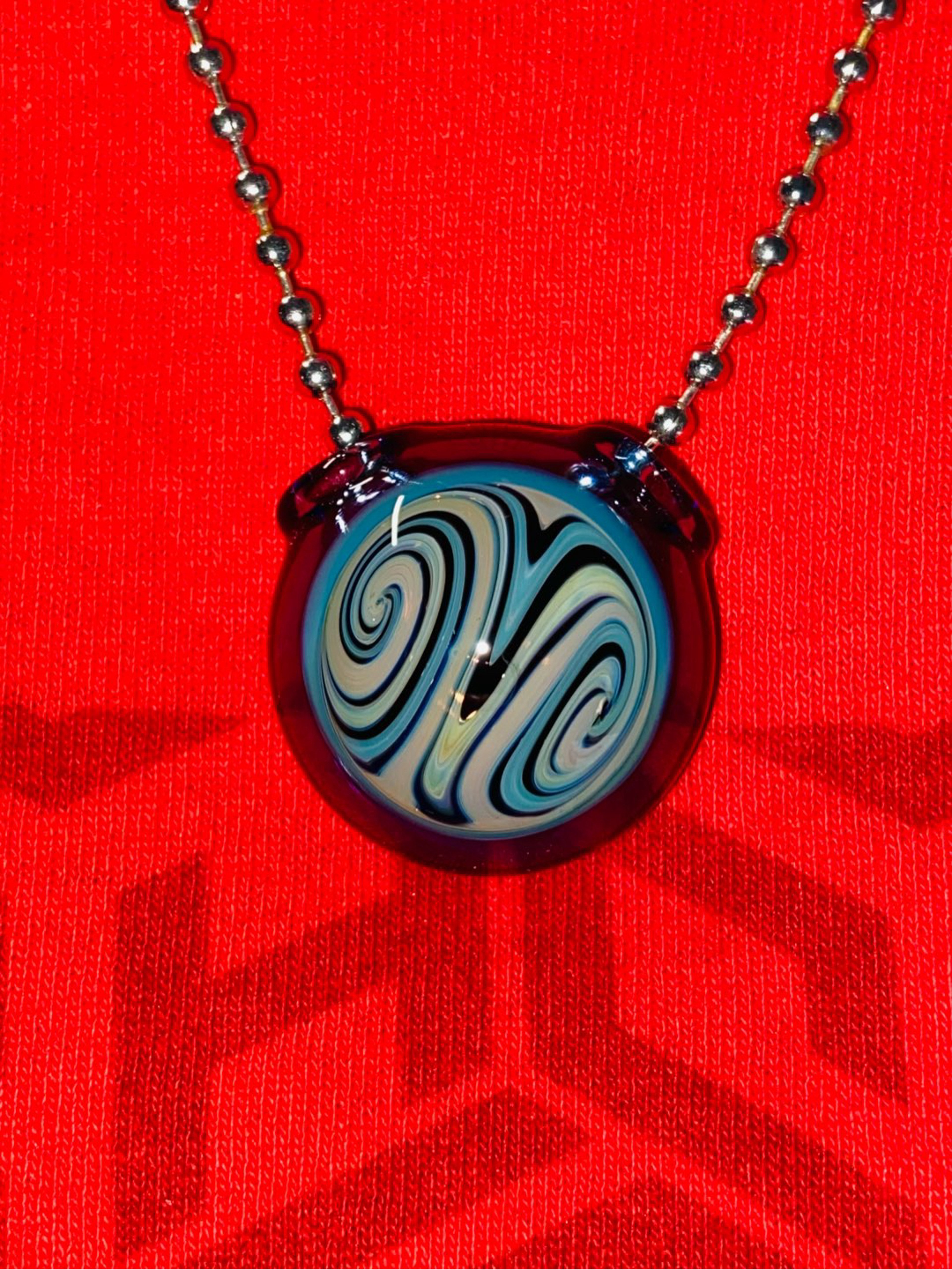 Preview pic of Heady Inside-out Ram Horn Pendant