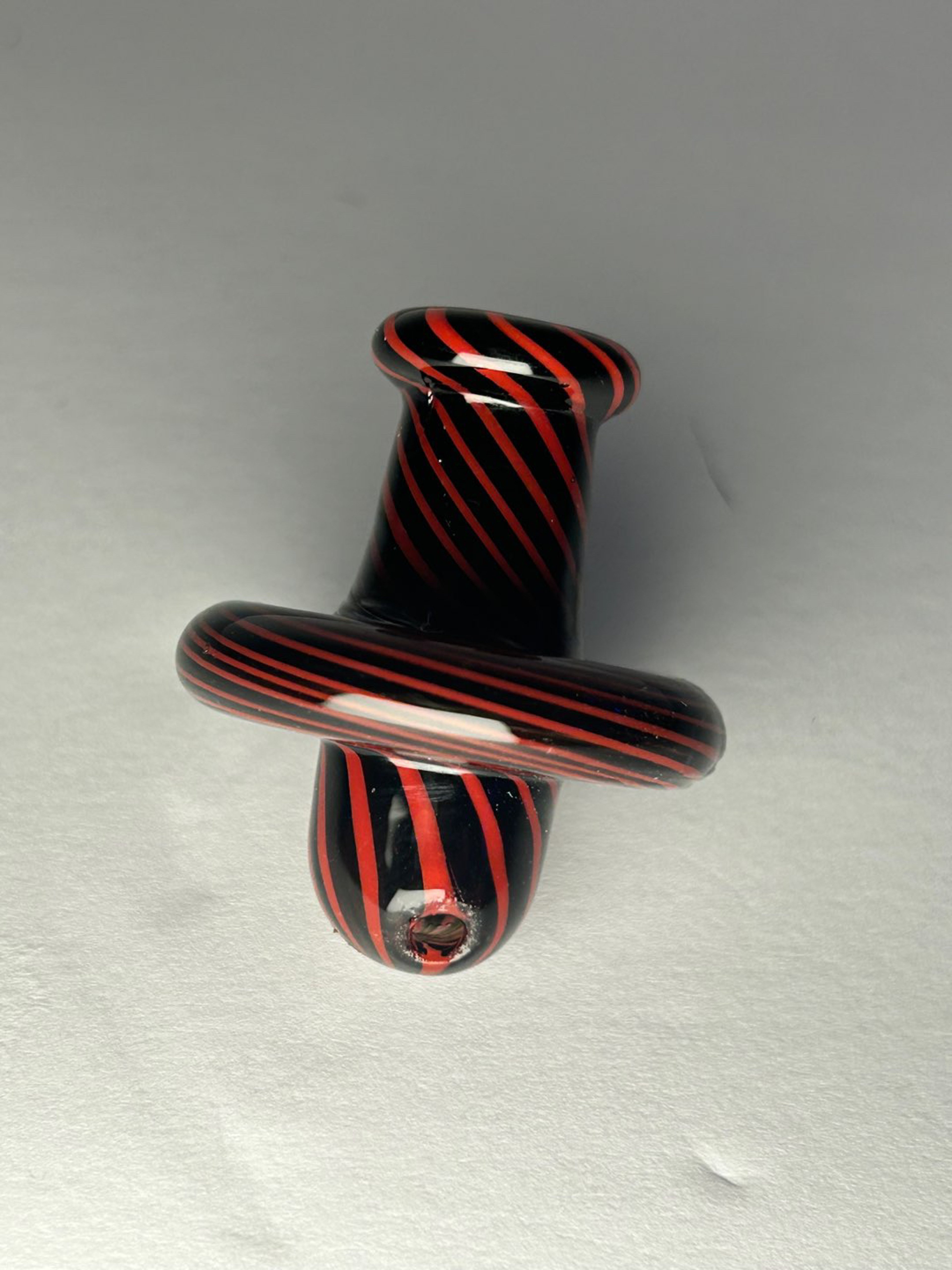 black and red swirl carb cap image 0