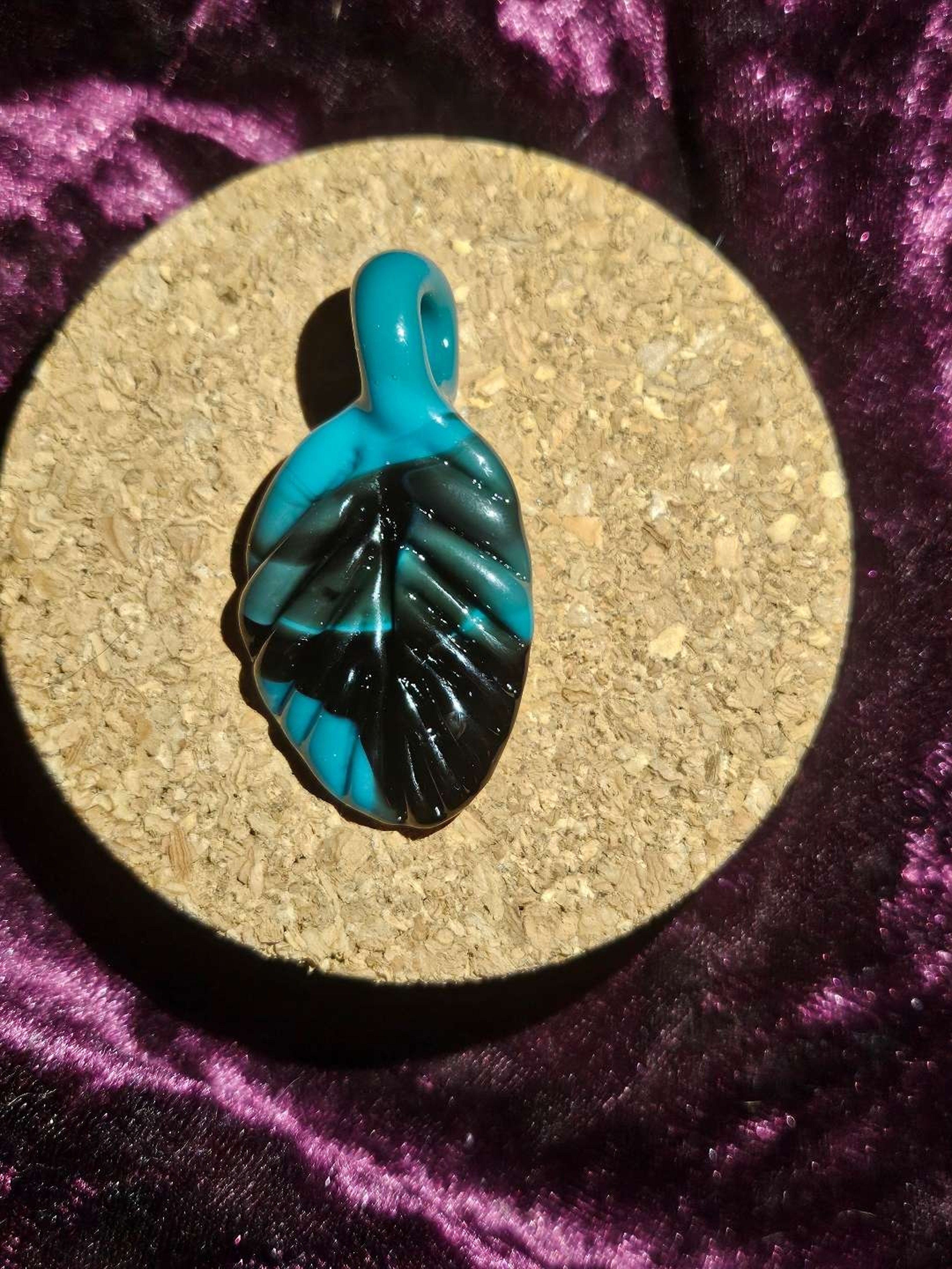 Preview pic of Aqua Azul and black leaf