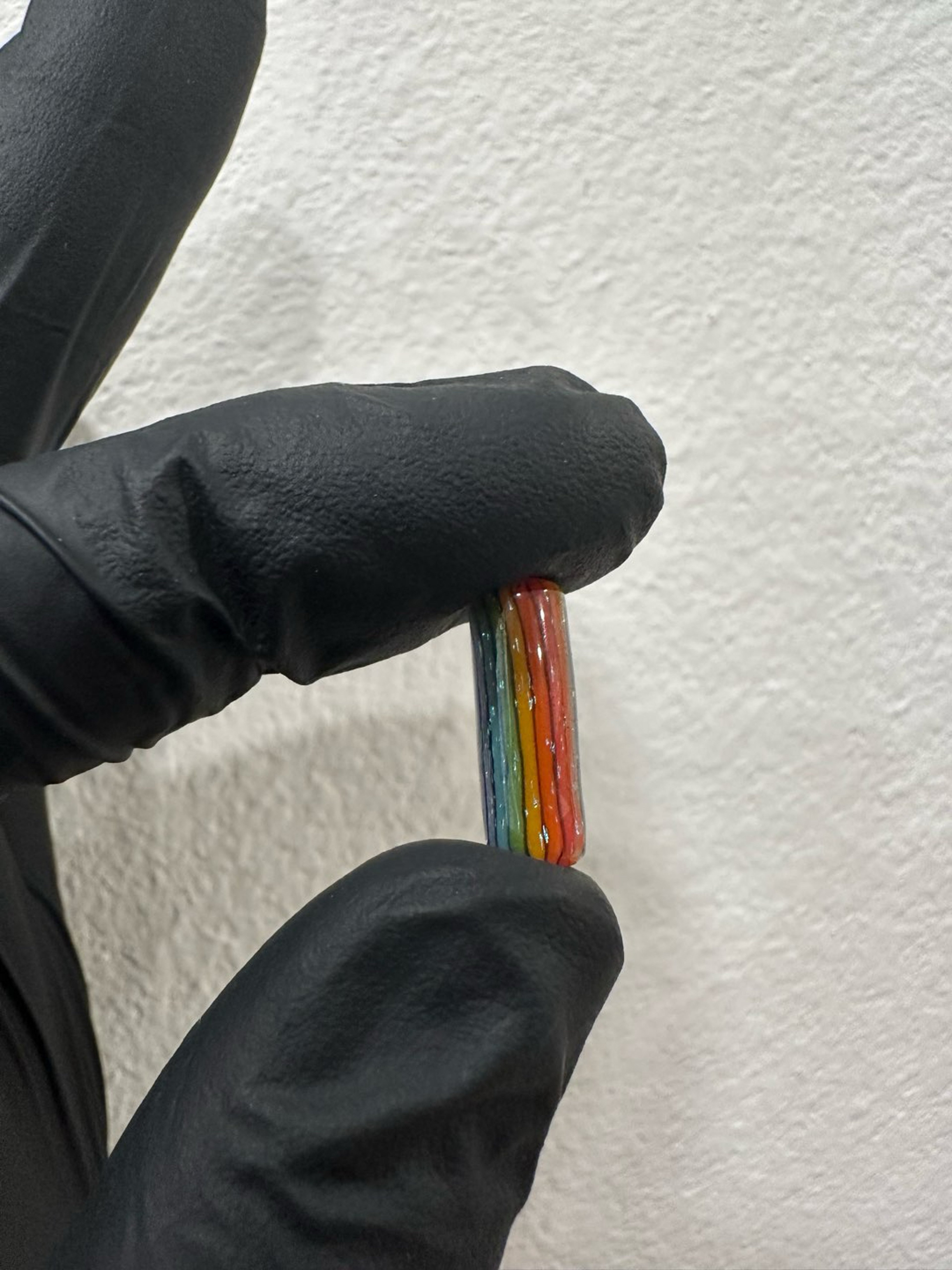 Preview pic of Darby Holmes rainbow tech pillar