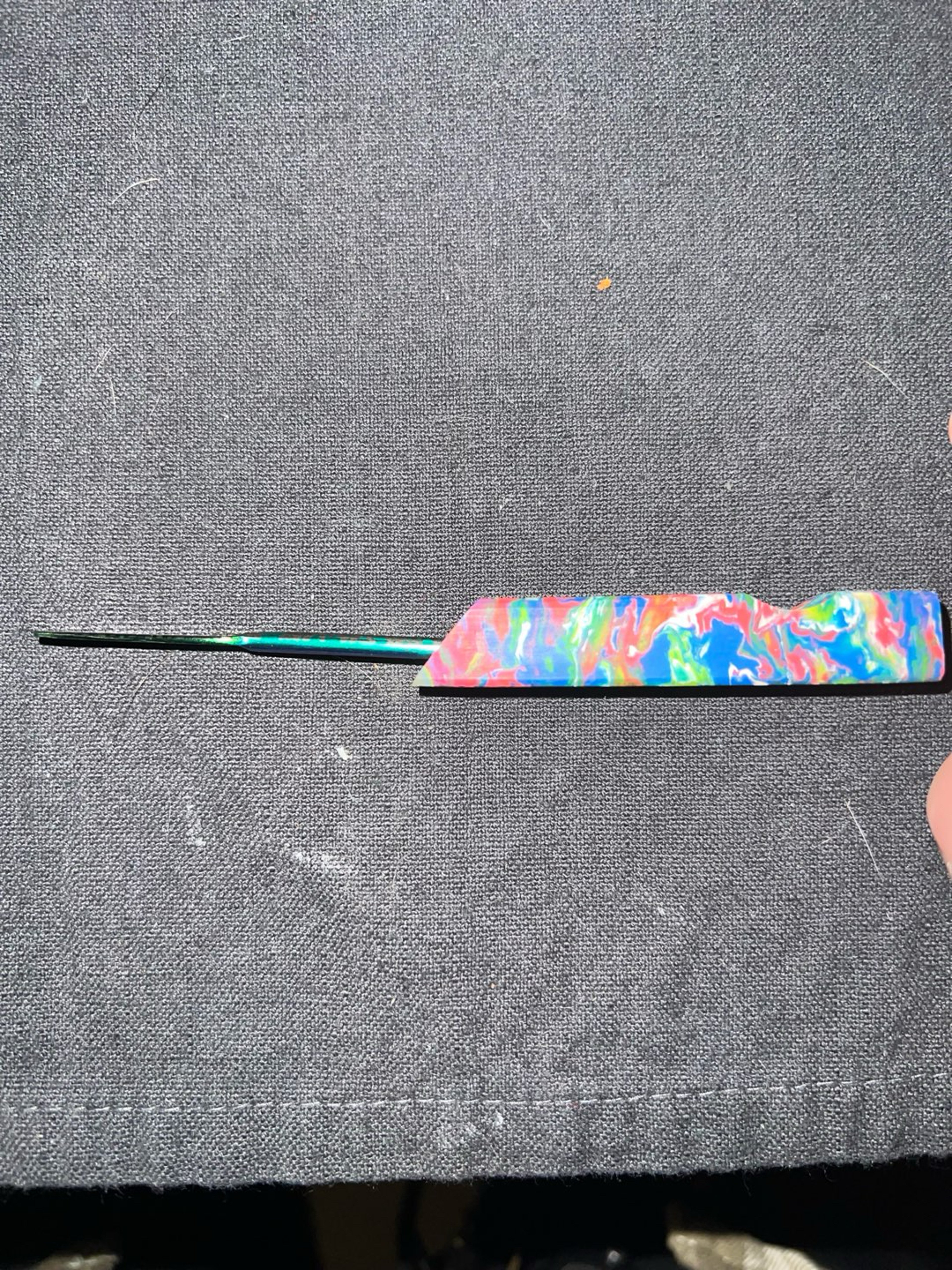 Preview pic of Brand new titanium kush kush tool with UV RESIN handle