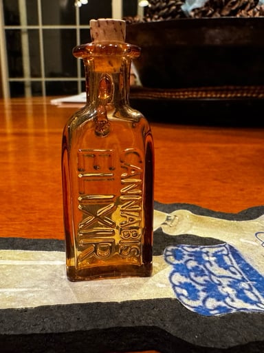 Preview pic of Kurt B Elixer Bottle Pendant